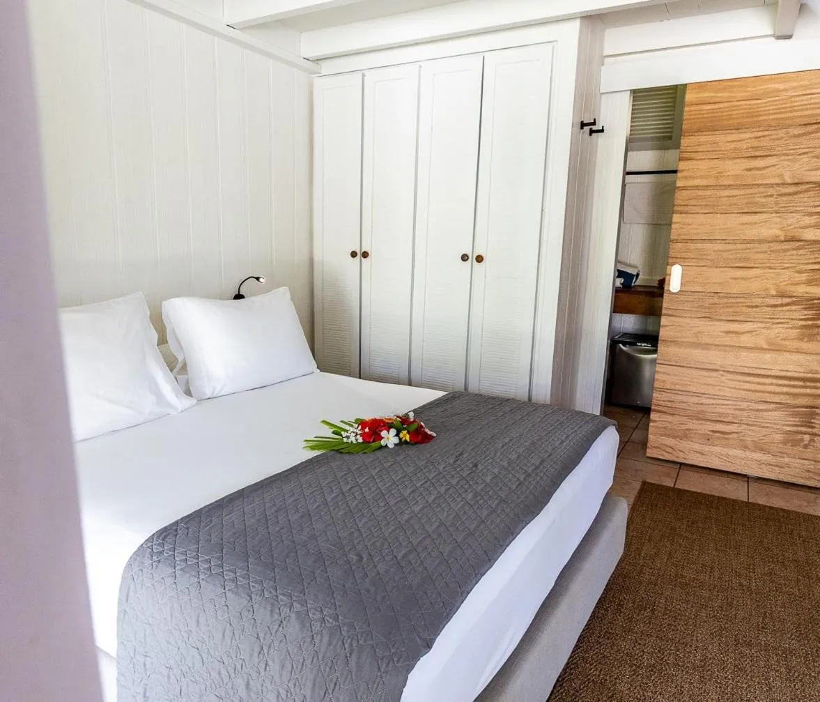 Bed in Moorea Island Beach Hotel
