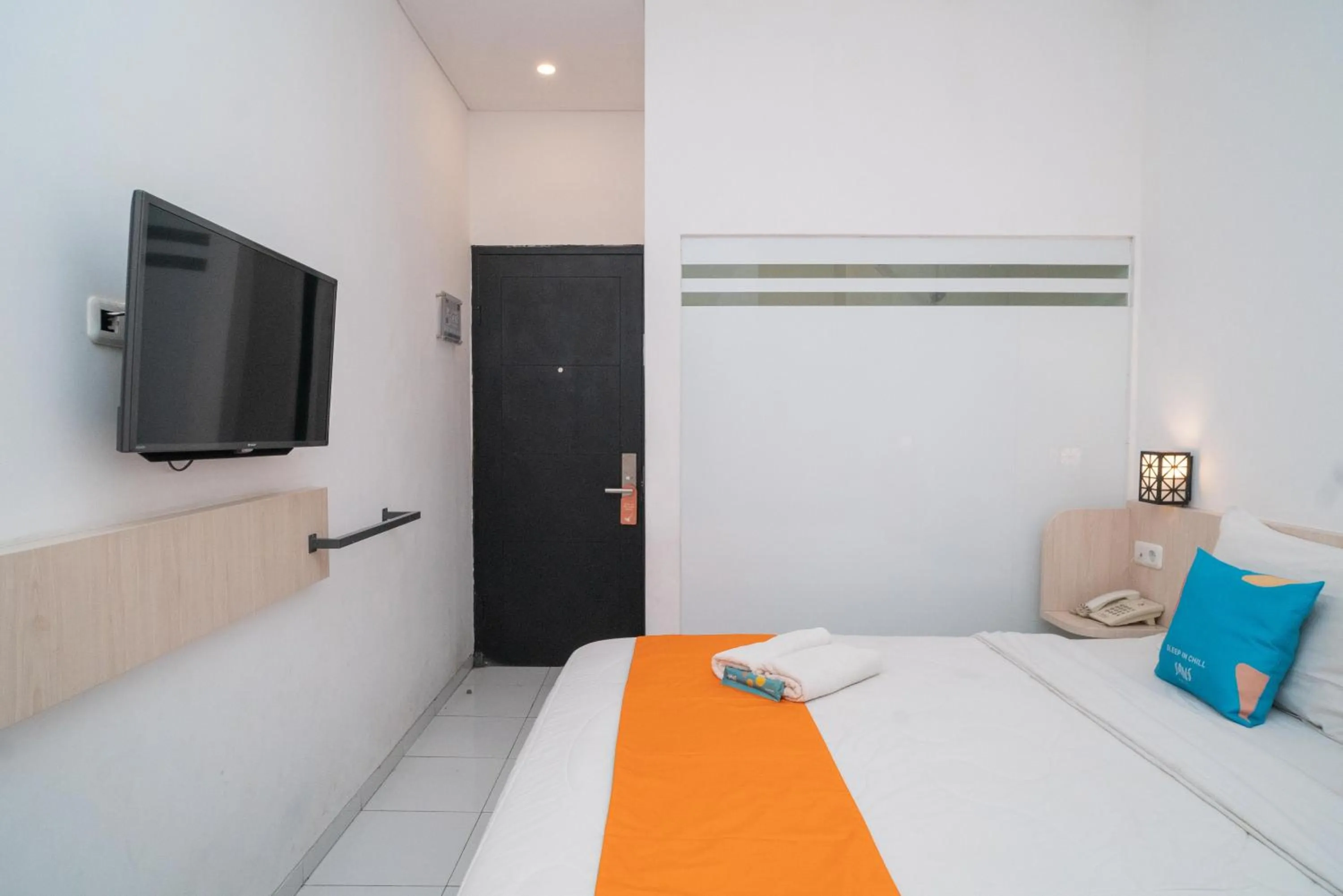 Bedroom, Bed in Sans Hotel FiFFa Premiere Malang