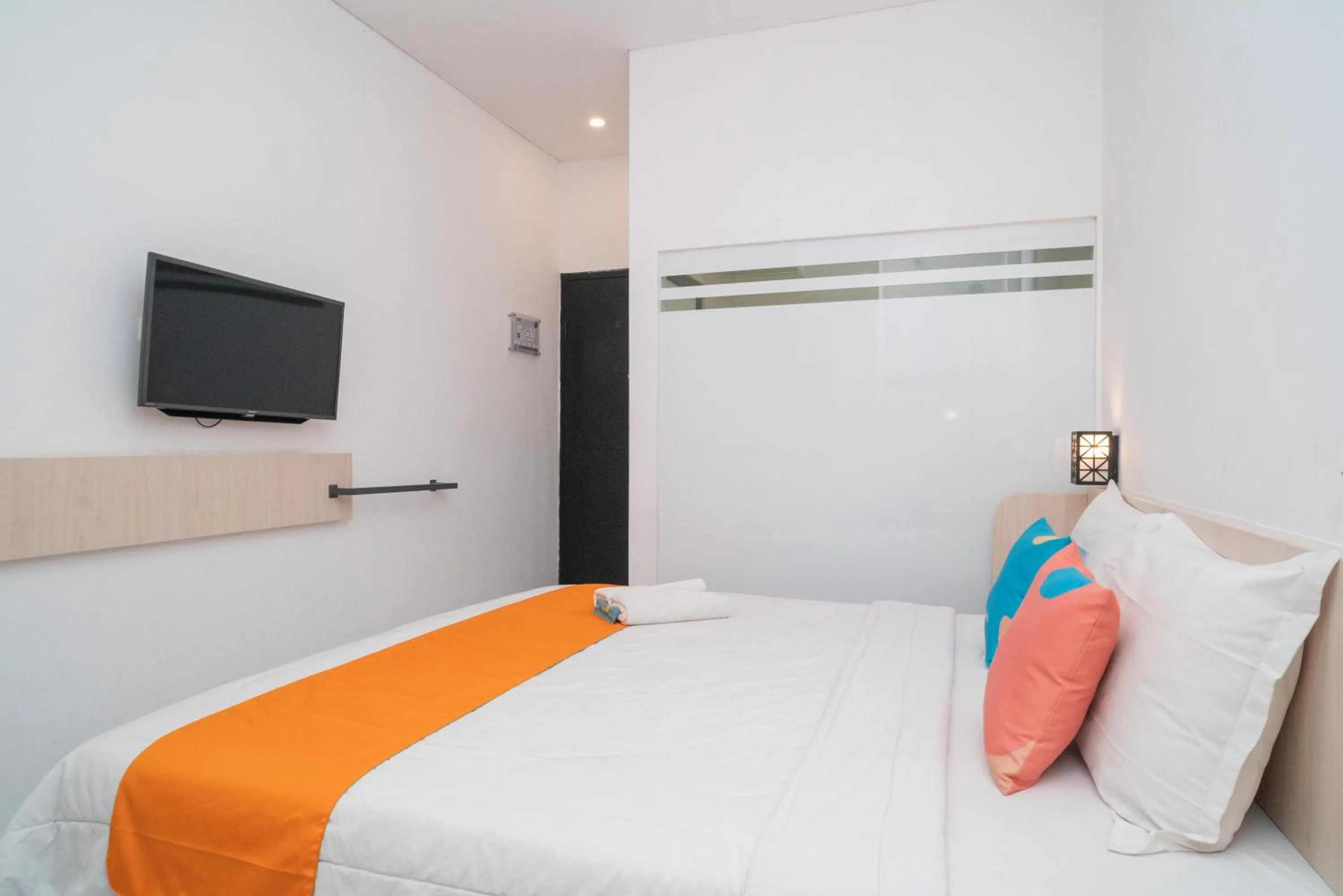 Bedroom, Bed in Sans Hotel FiFFa Premiere Malang