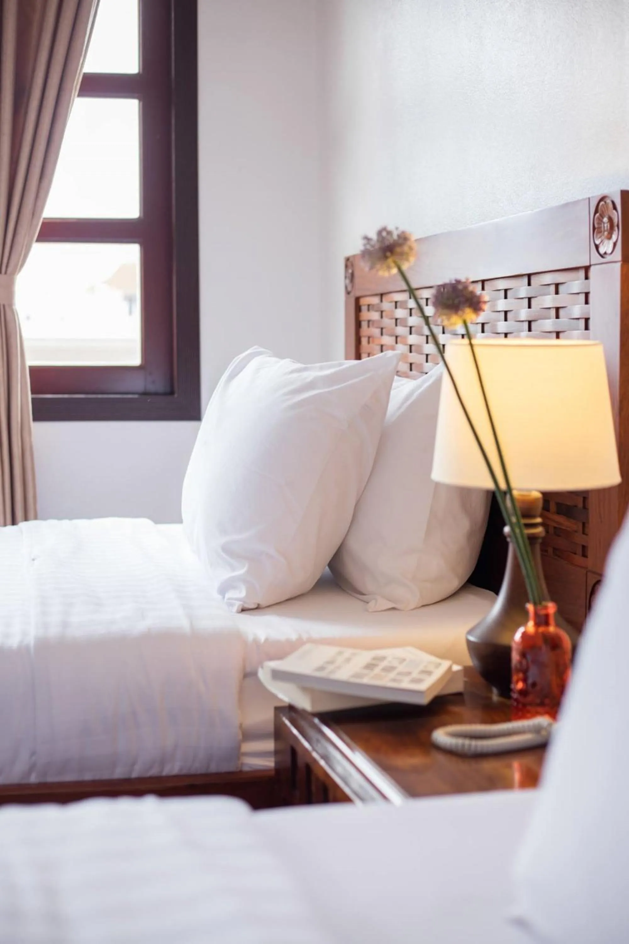 Bed in Lao Orchid Hotel