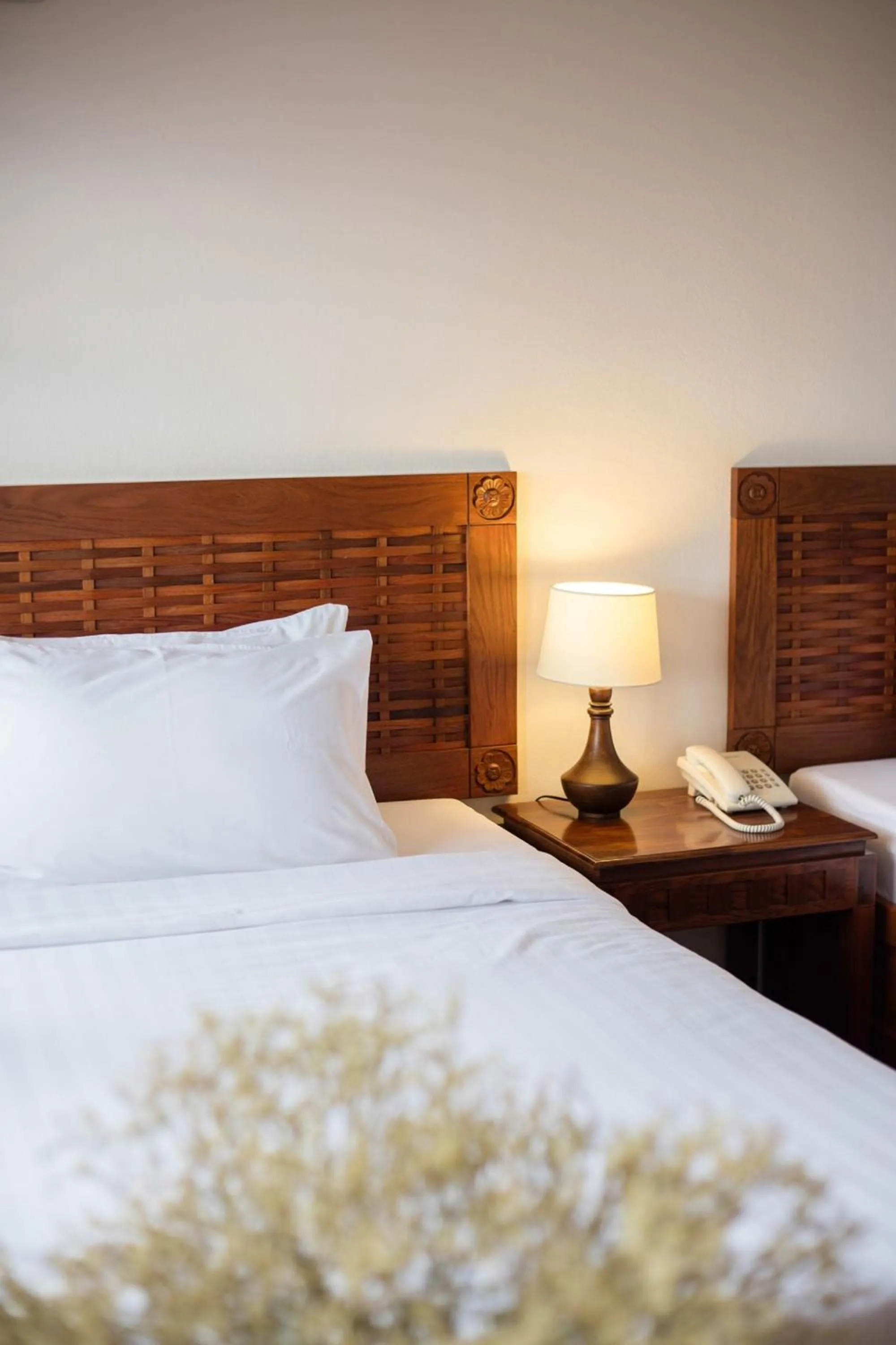 Bed in Lao Orchid Hotel