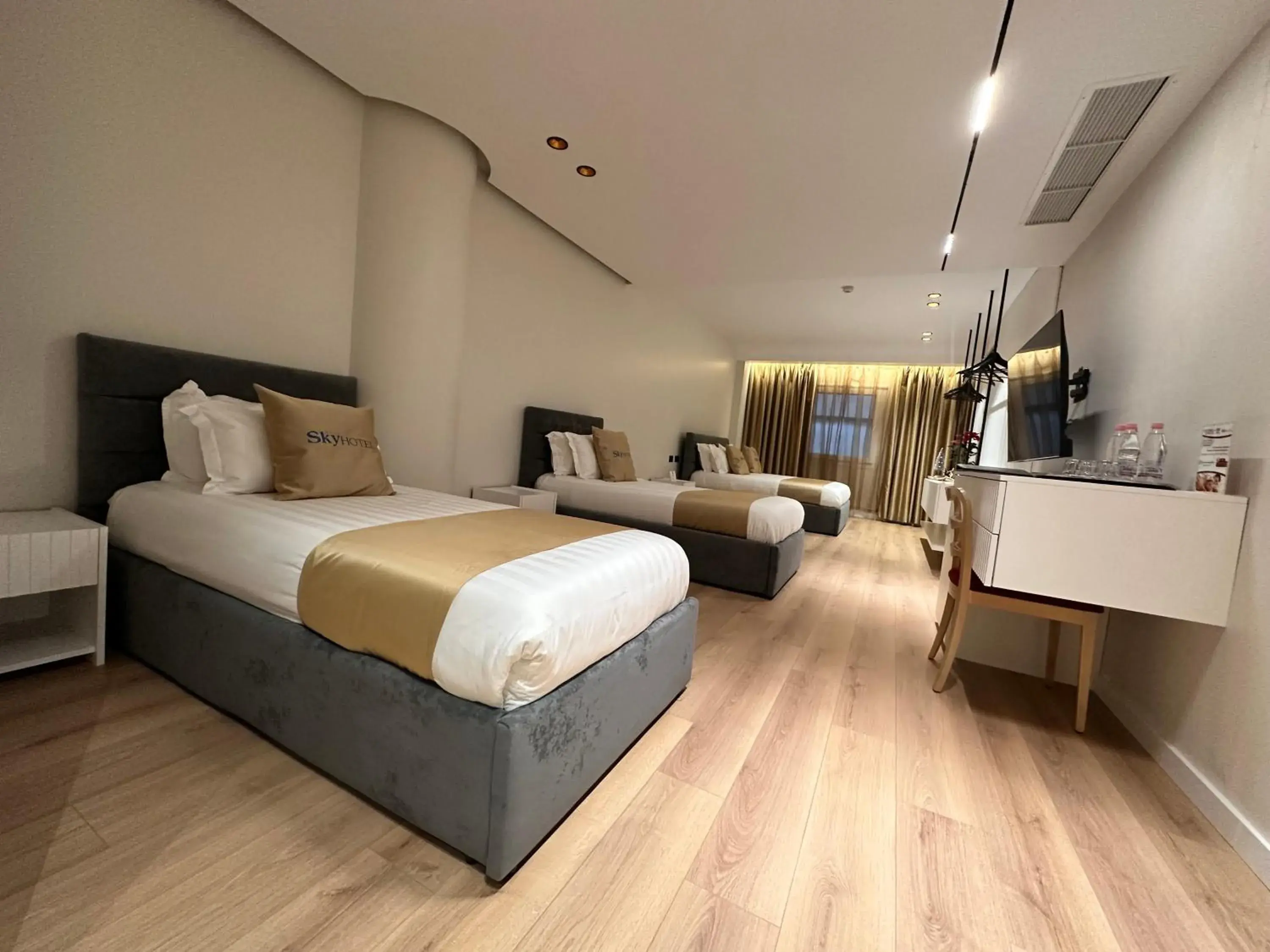 Deluxe Quadruple Room in Sky 2 Hotel Tirana Deluxe Quadruple Room in Sky 2 Hotel Tirana