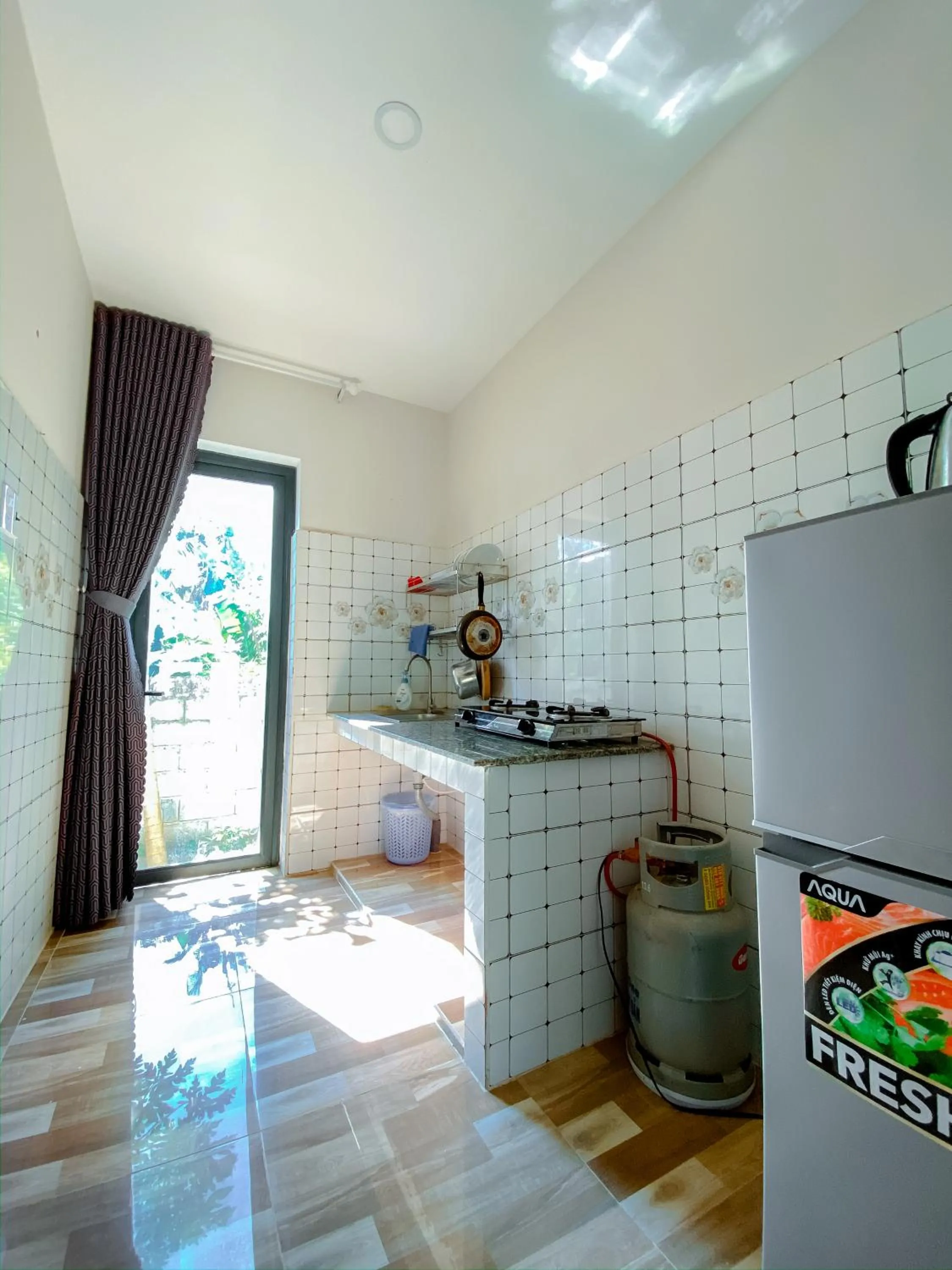 Kitchen or kitchenette in Phu My Hung Bungalow