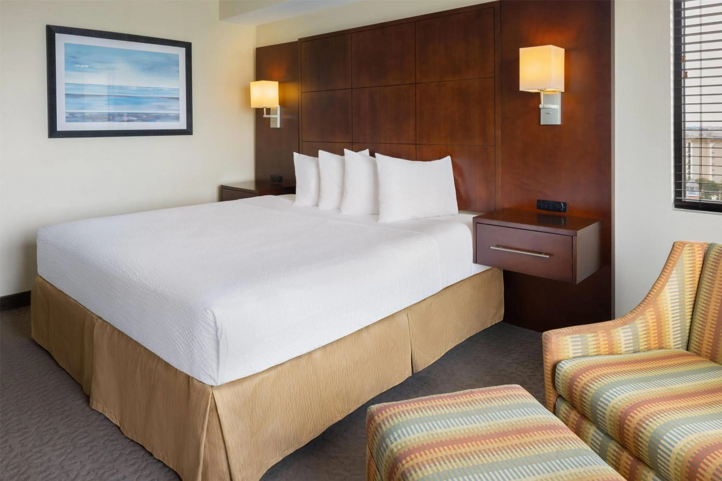 Photo of the whole room, Bed in Ramada Plaza by Wyndham Orlando Resort & Suites Intl Drive - Newly Renovated!