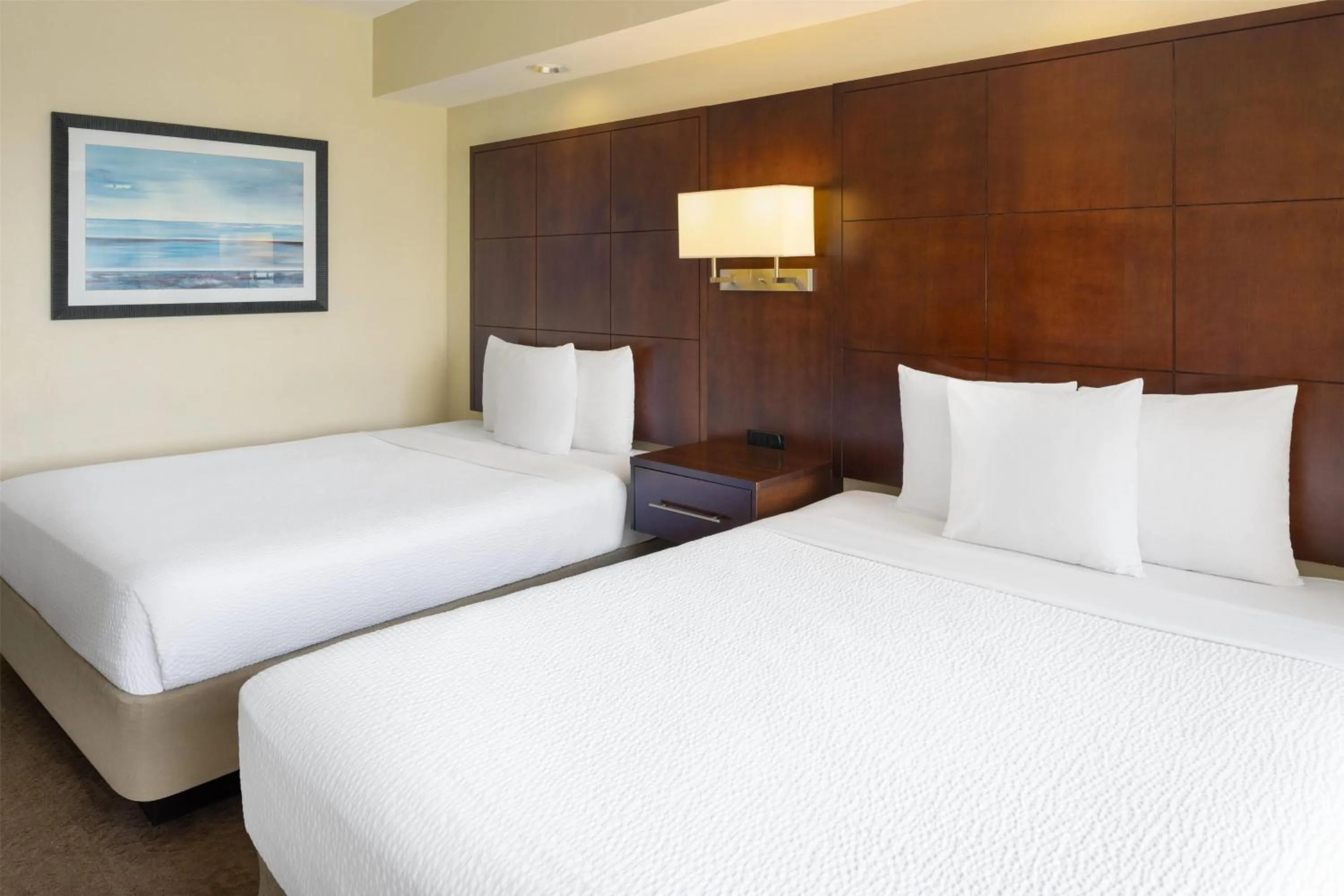 Photo of the whole room, Bed in Ramada Plaza by Wyndham Orlando Resort & Suites Intl Drive - Newly Renovated!