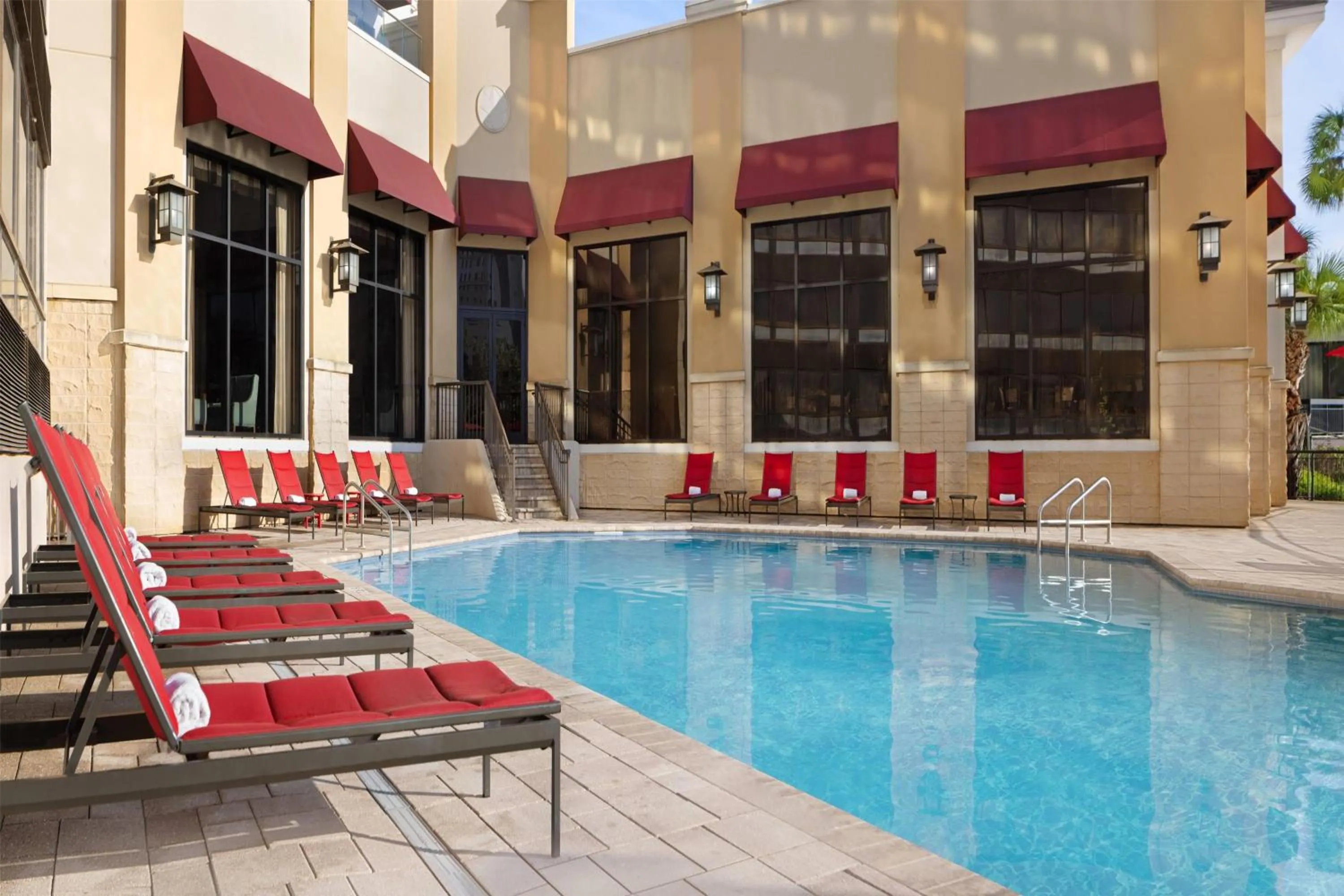 Pool view in Ramada Plaza by Wyndham Orlando Resort & Suites Intl Drive - Newly Renovated!