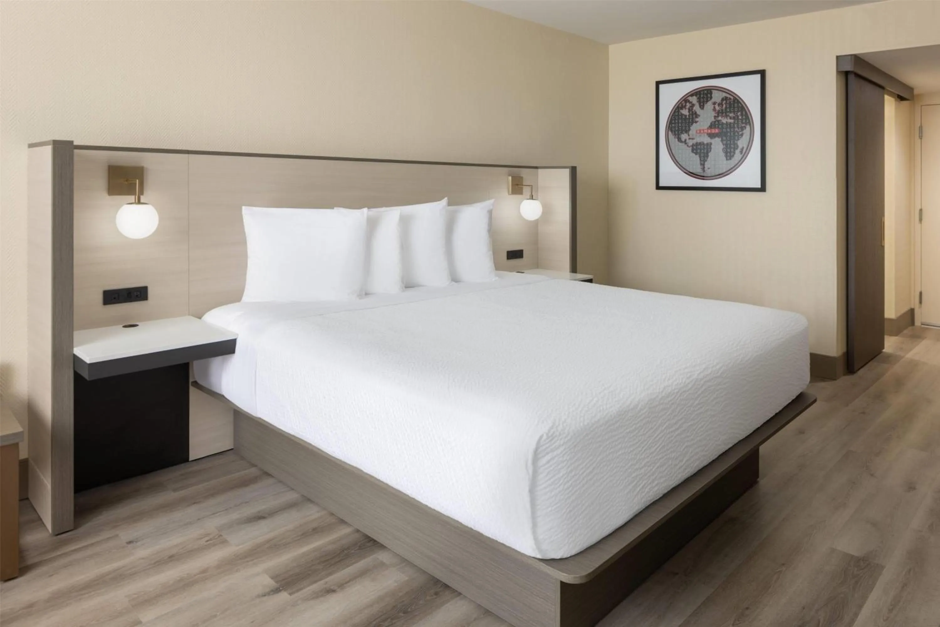 Photo of the whole room, Bed in Ramada Plaza by Wyndham Orlando Resort & Suites Intl Drive - Newly Renovated!