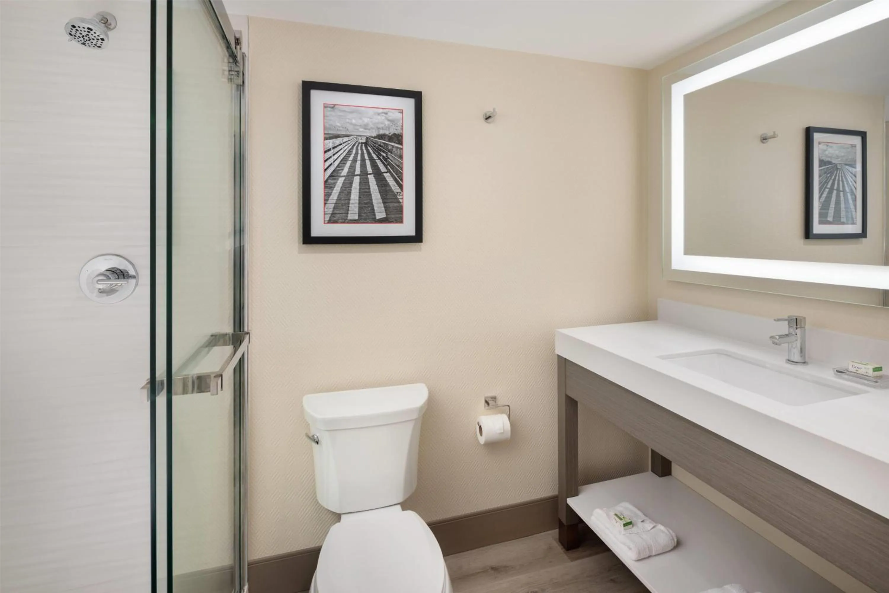 Bathroom in Ramada Plaza by Wyndham Orlando Resort & Suites Intl Drive - Newly Renovated!