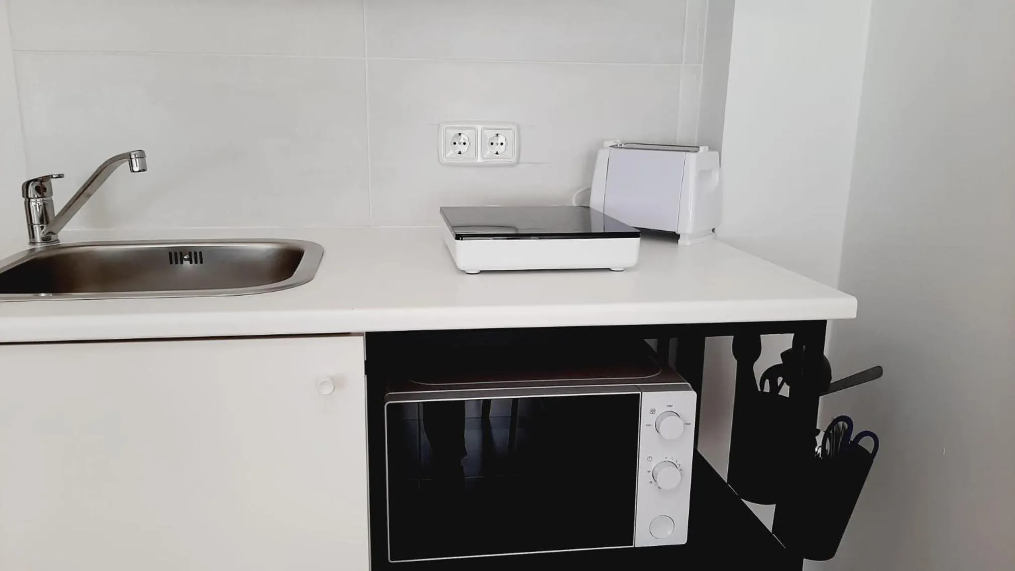 Kitchen or kitchenette in Hostal Lucia by gaiarooms