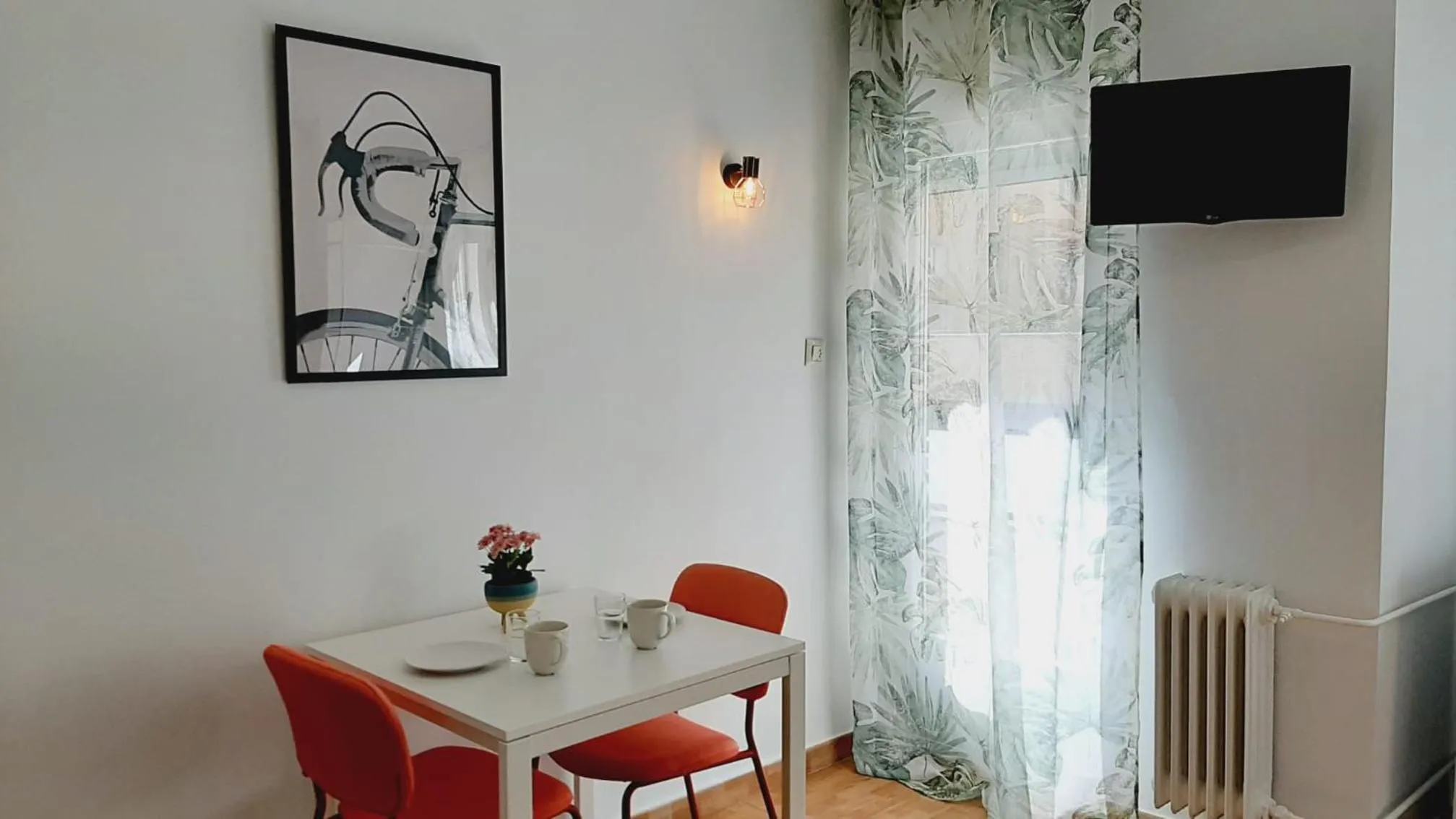 Living room in Hostal Lucia by gaiarooms