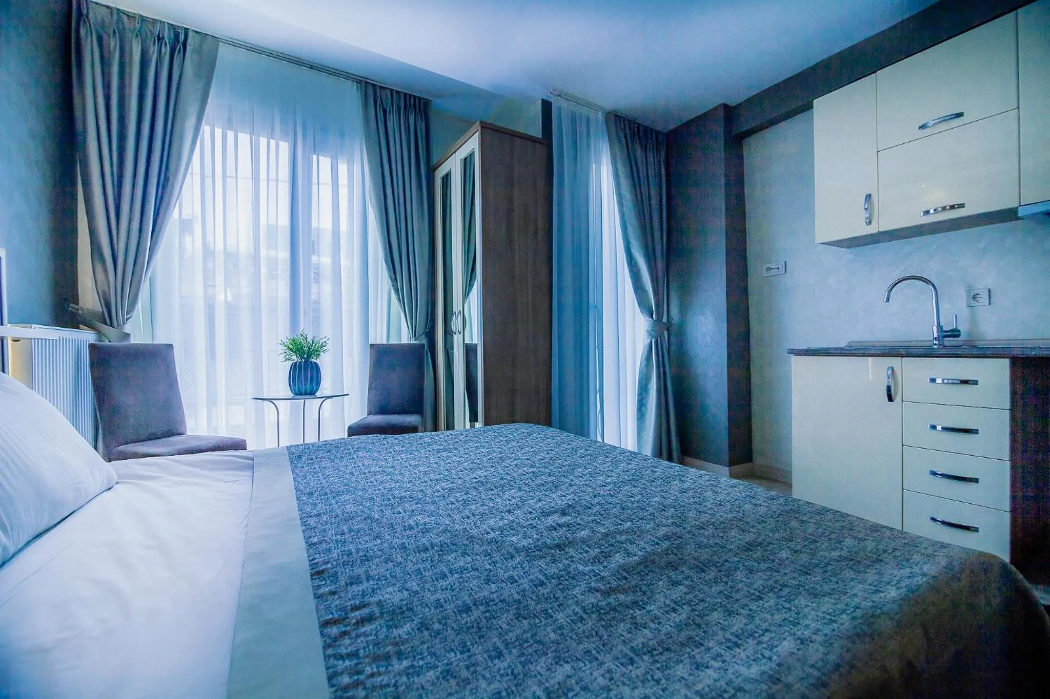 Bed in Kavalalı Suites