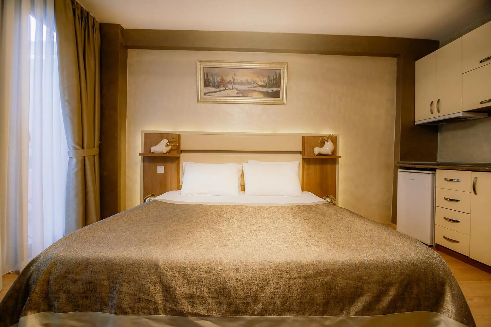 Bed in Kavalalı Suites