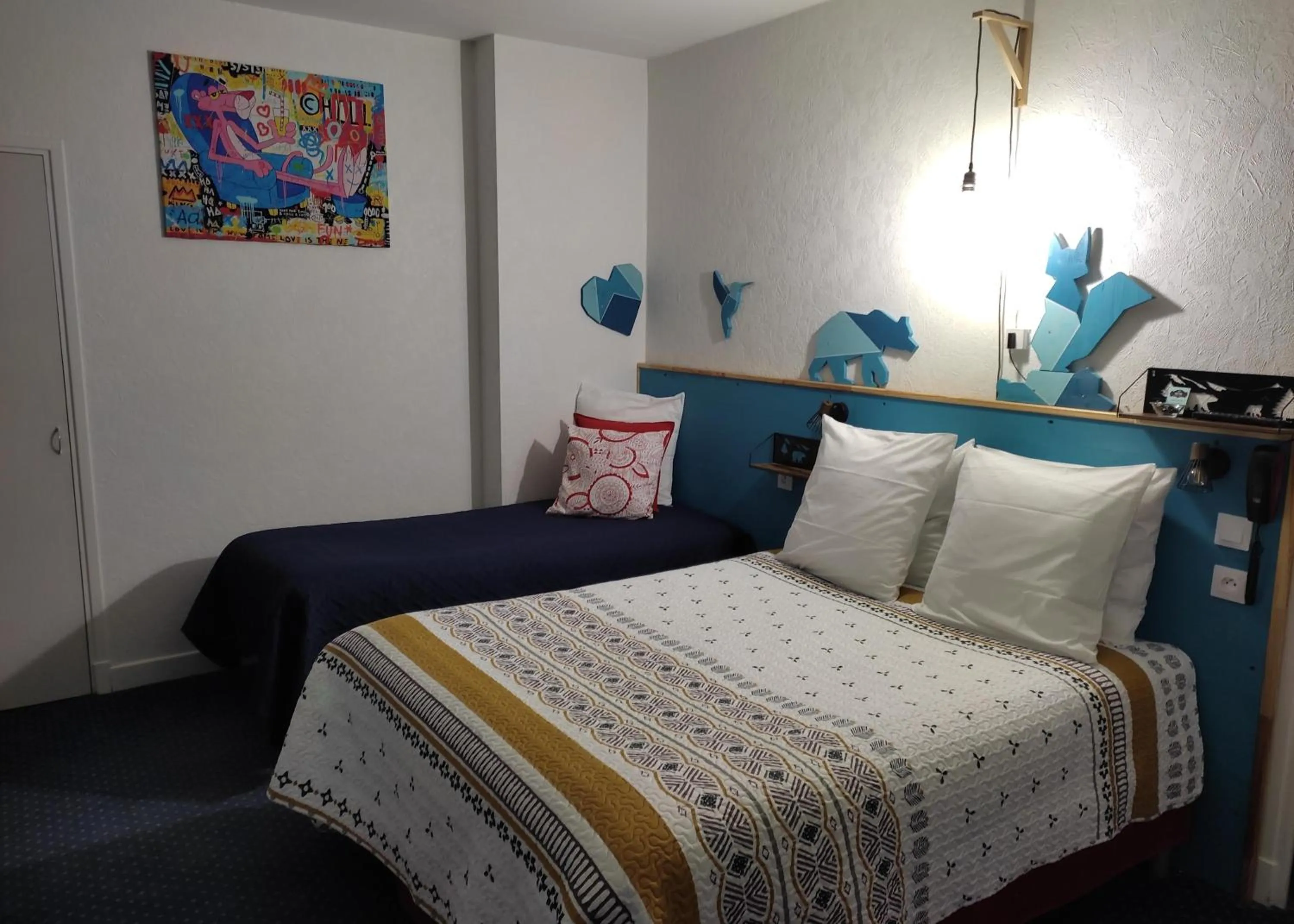 Bed in Hôtel Confort 09 ou HC-09