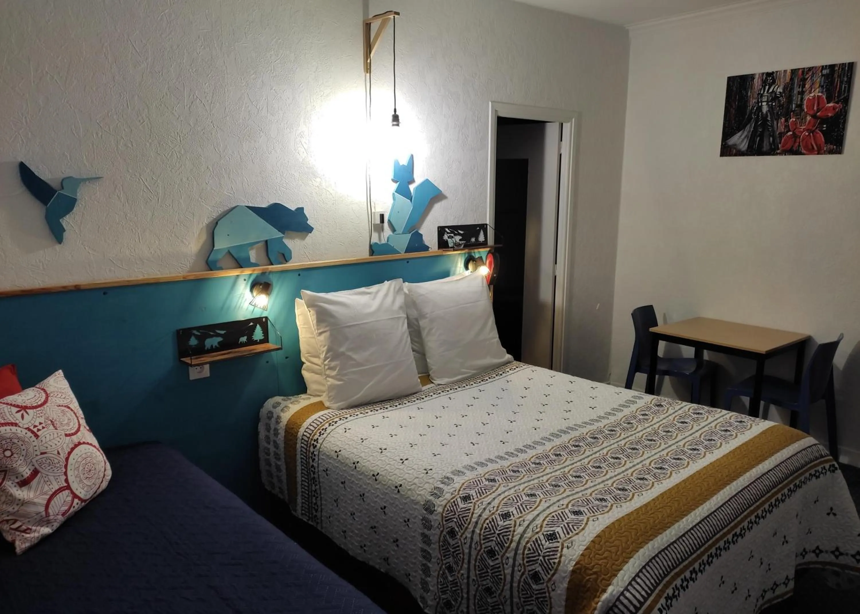 Bed in Hôtel Confort 09 ou HC-09