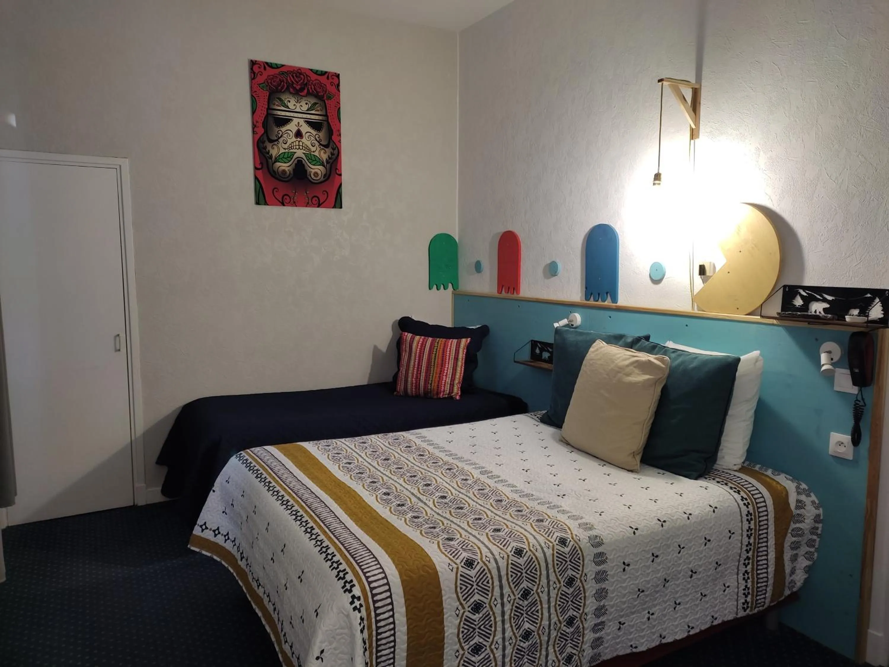 Bed in Hôtel Confort 09 ou HC-09