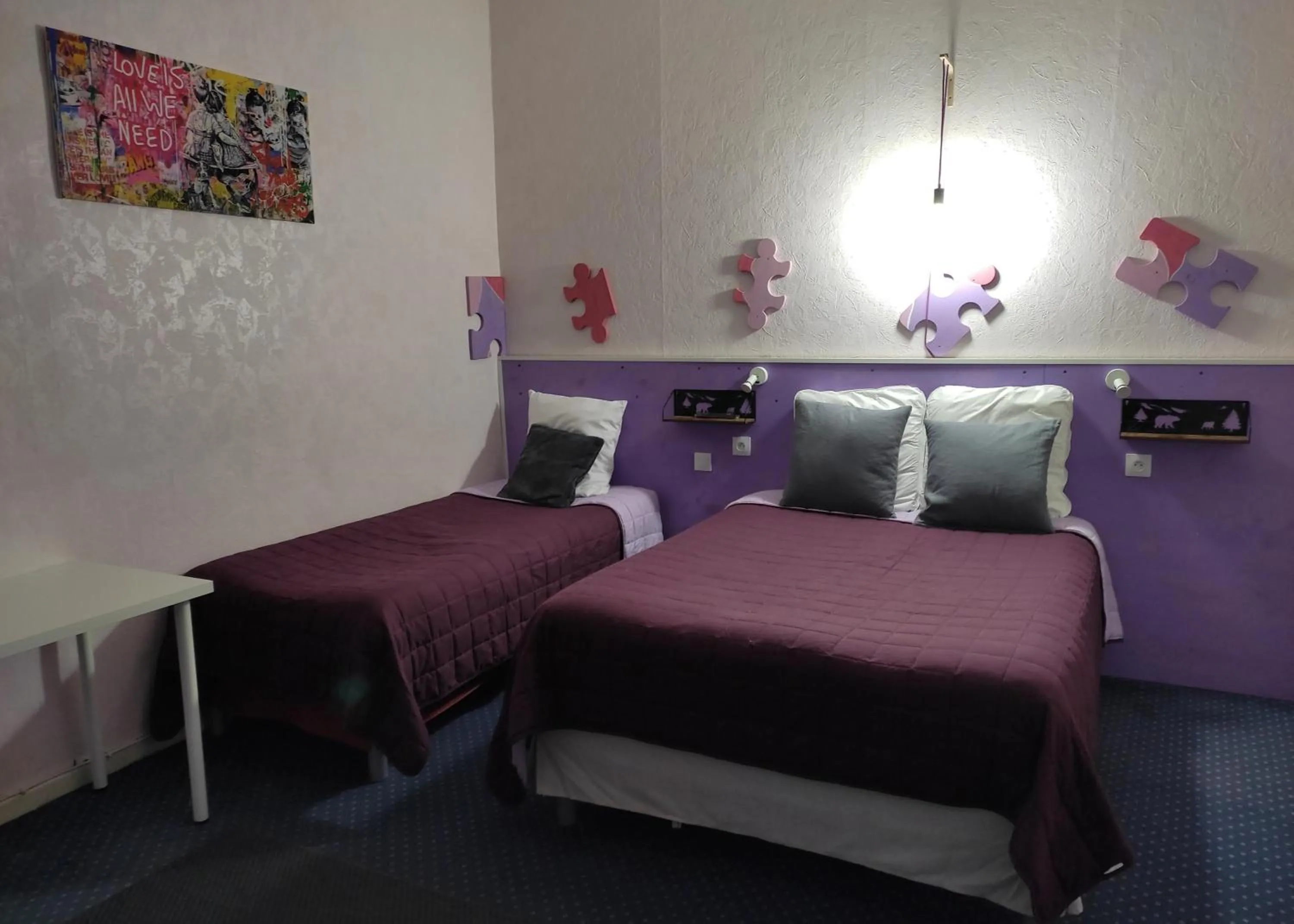 Bed in Hôtel Confort 09 ou HC-09