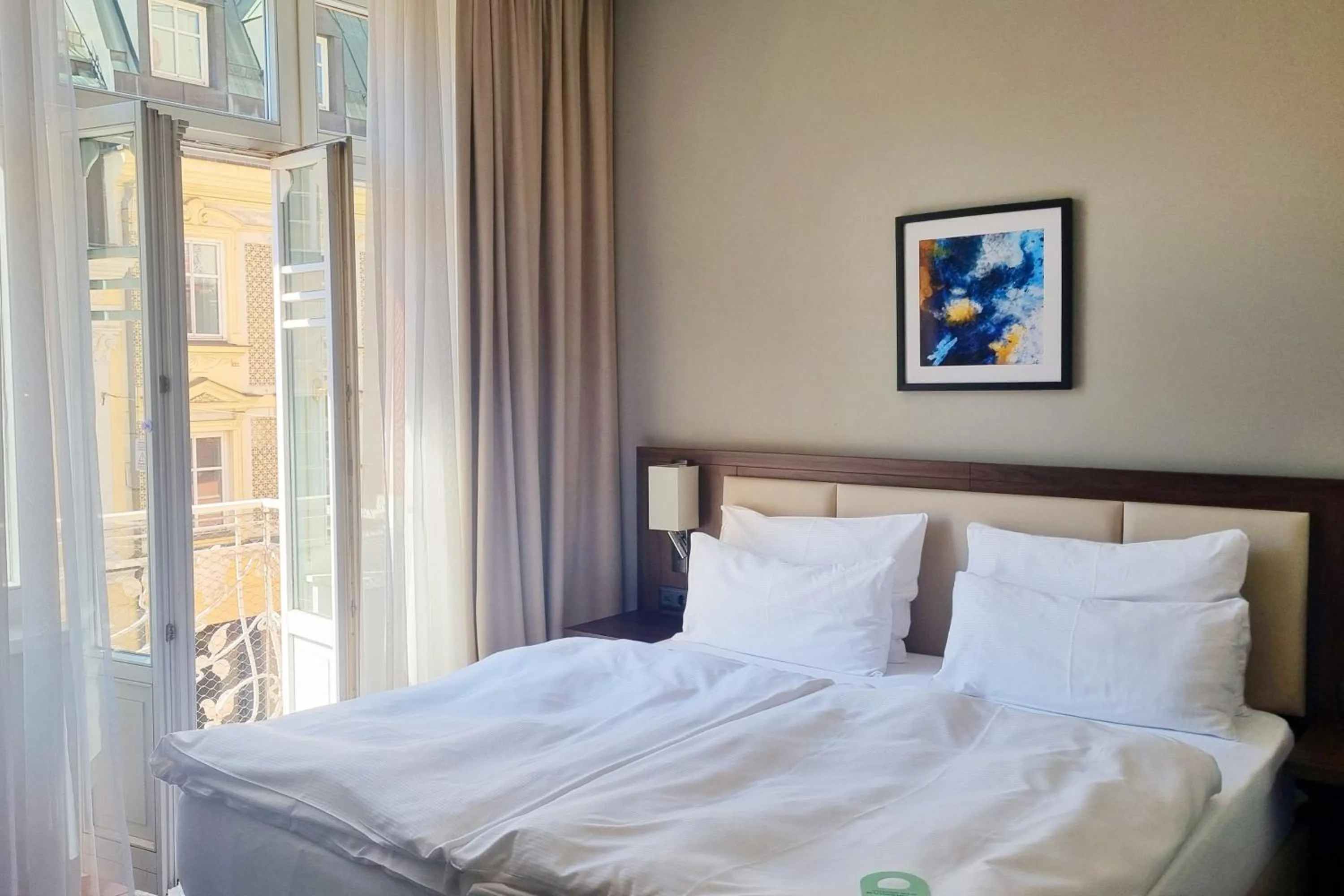 Photo of the whole room, Bed in Garner Hotel Klagenfurt - Moser Verdino by IHG