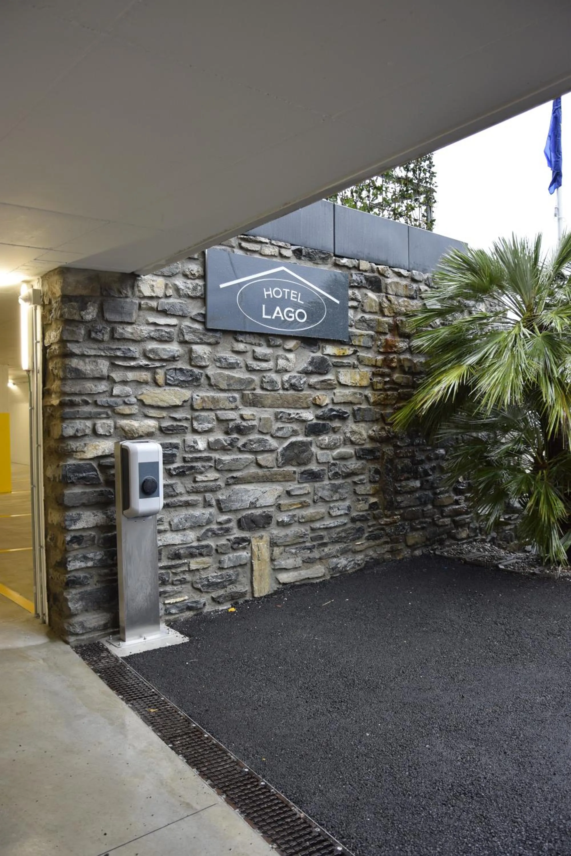 Property logo or sign in Hotel Lago