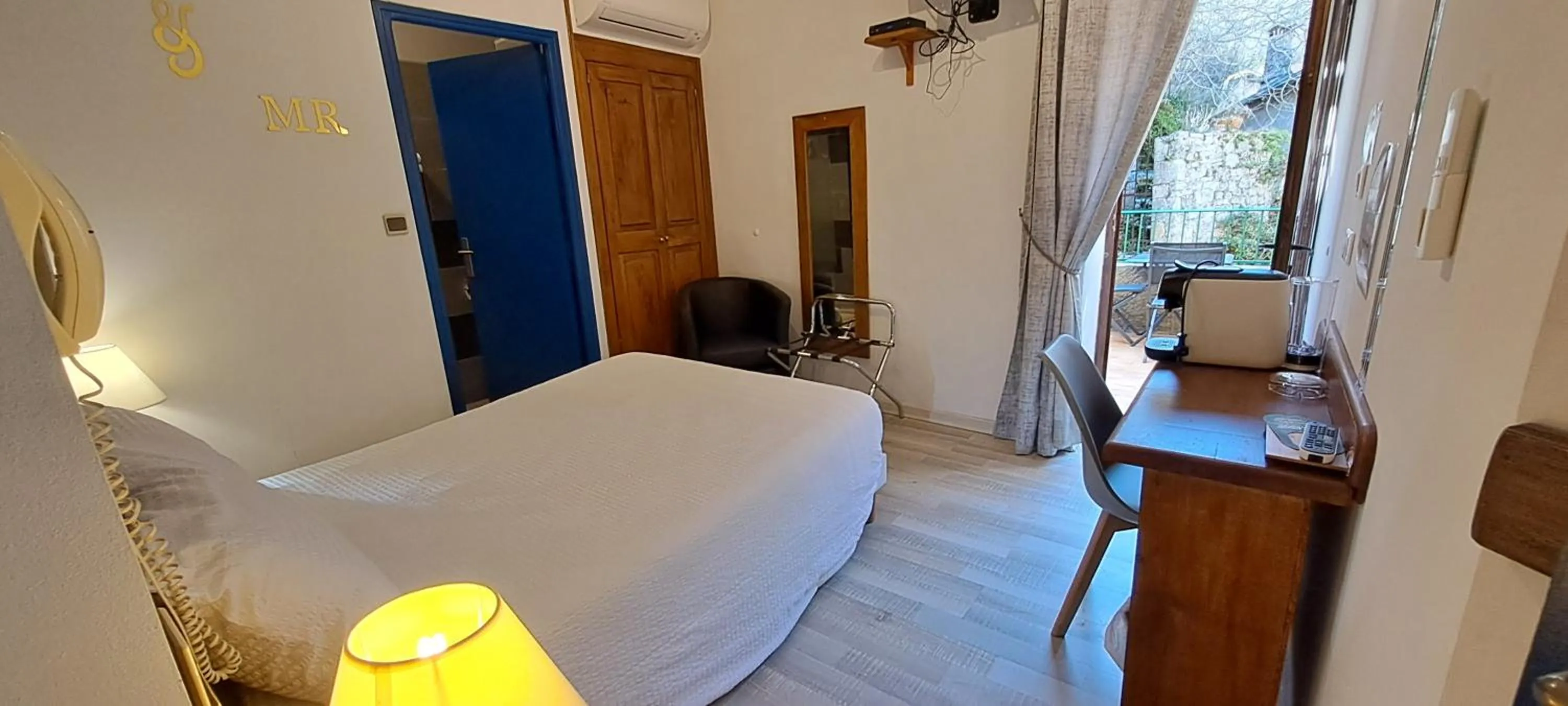 Bedroom, Bed in Logis Hôtel restaurant Auberge de la Cascade