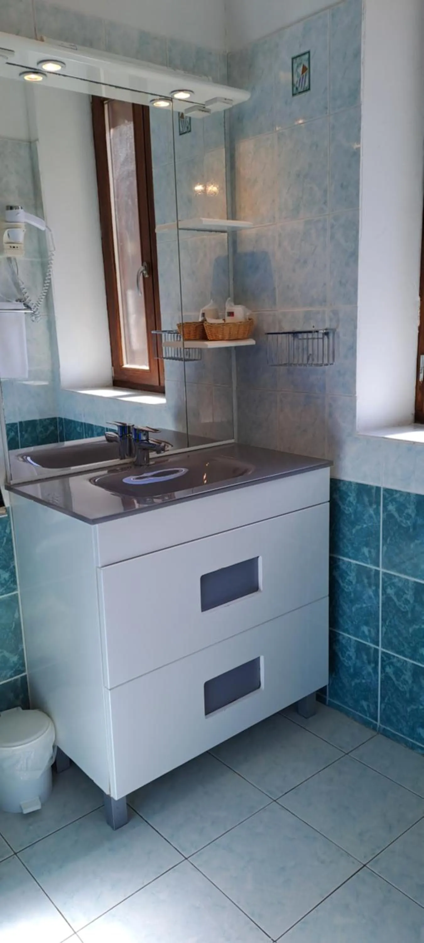 Bathroom in Logis Hôtel restaurant Auberge de la Cascade