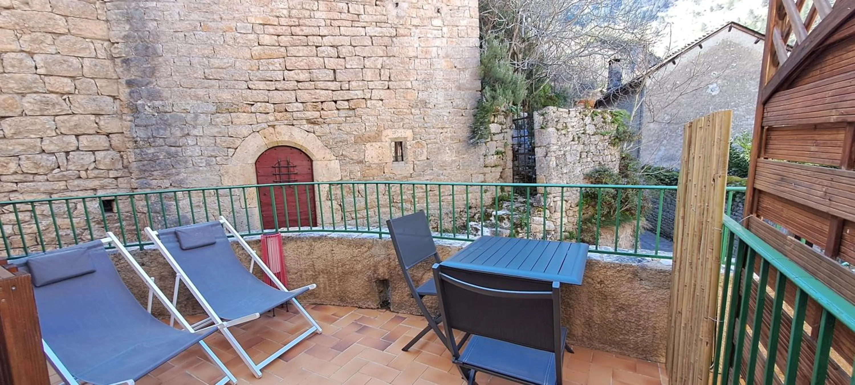 Balcony/Terrace in Logis Hôtel restaurant Auberge de la Cascade