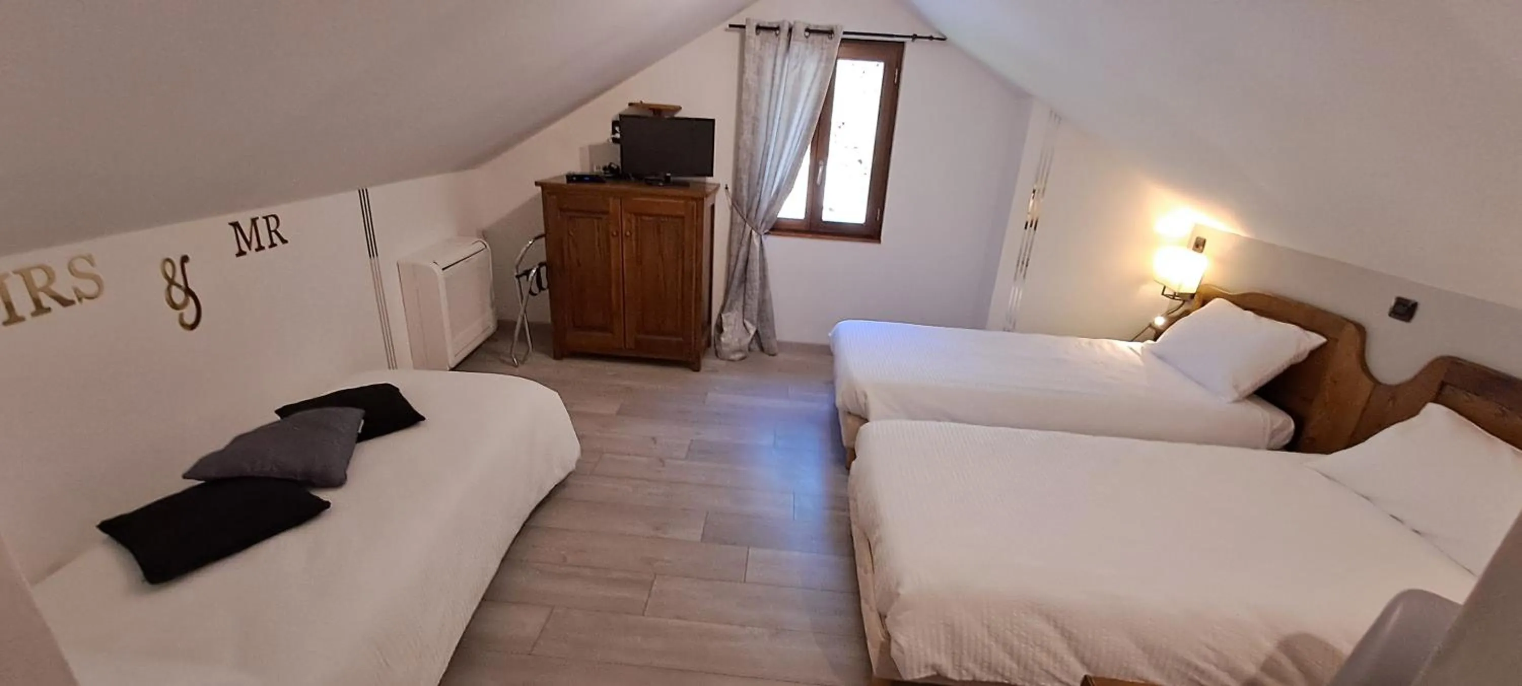 Bedroom, Bed in Logis Hôtel restaurant Auberge de la Cascade