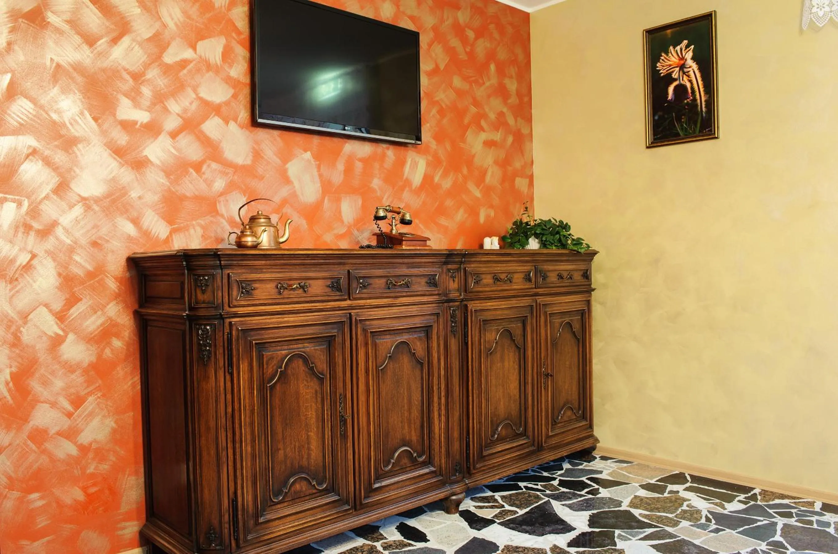 TV and multimedia in Embrace Hotel & Apartments