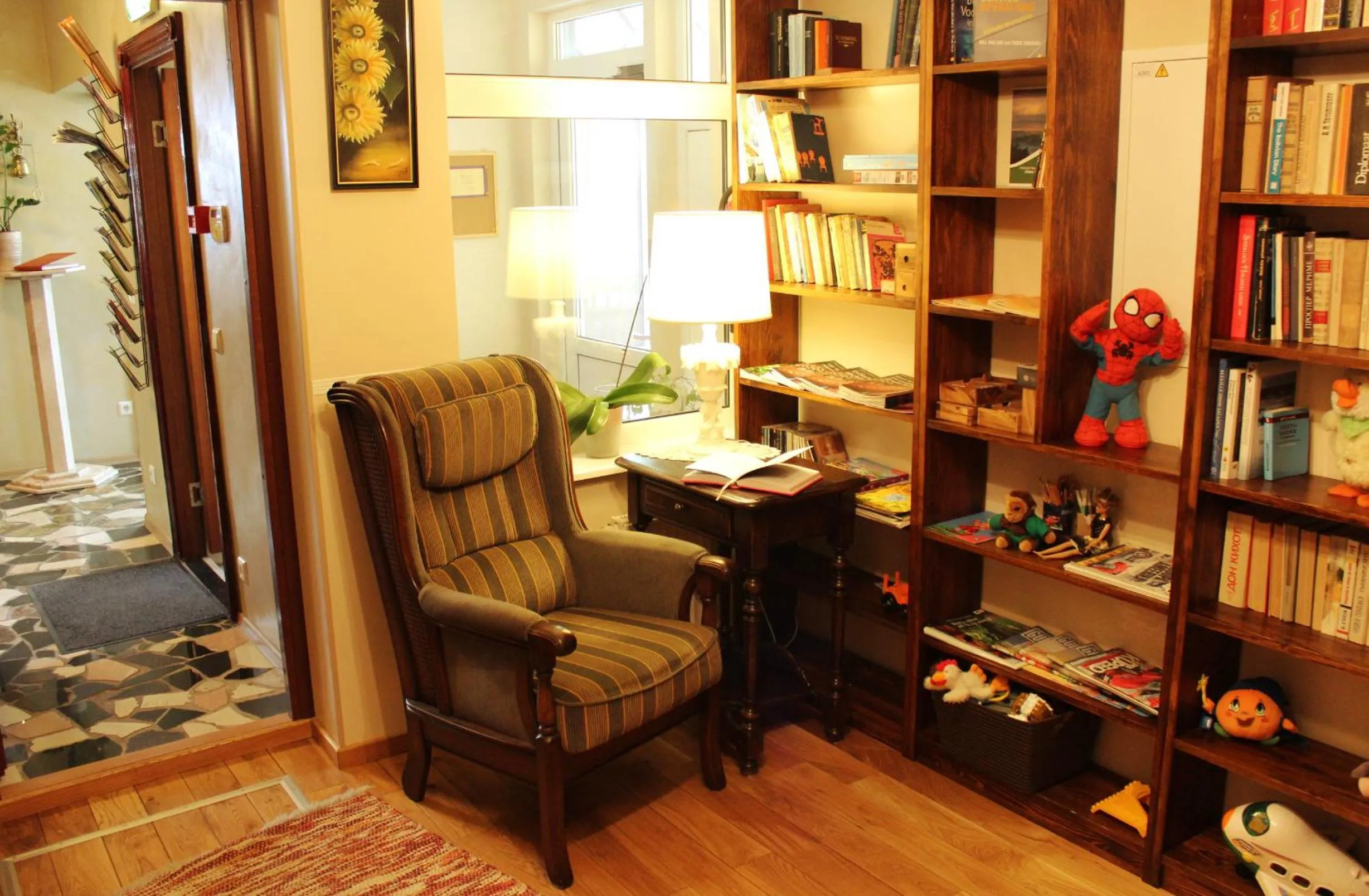 Library in Embrace Hotel & Apartments