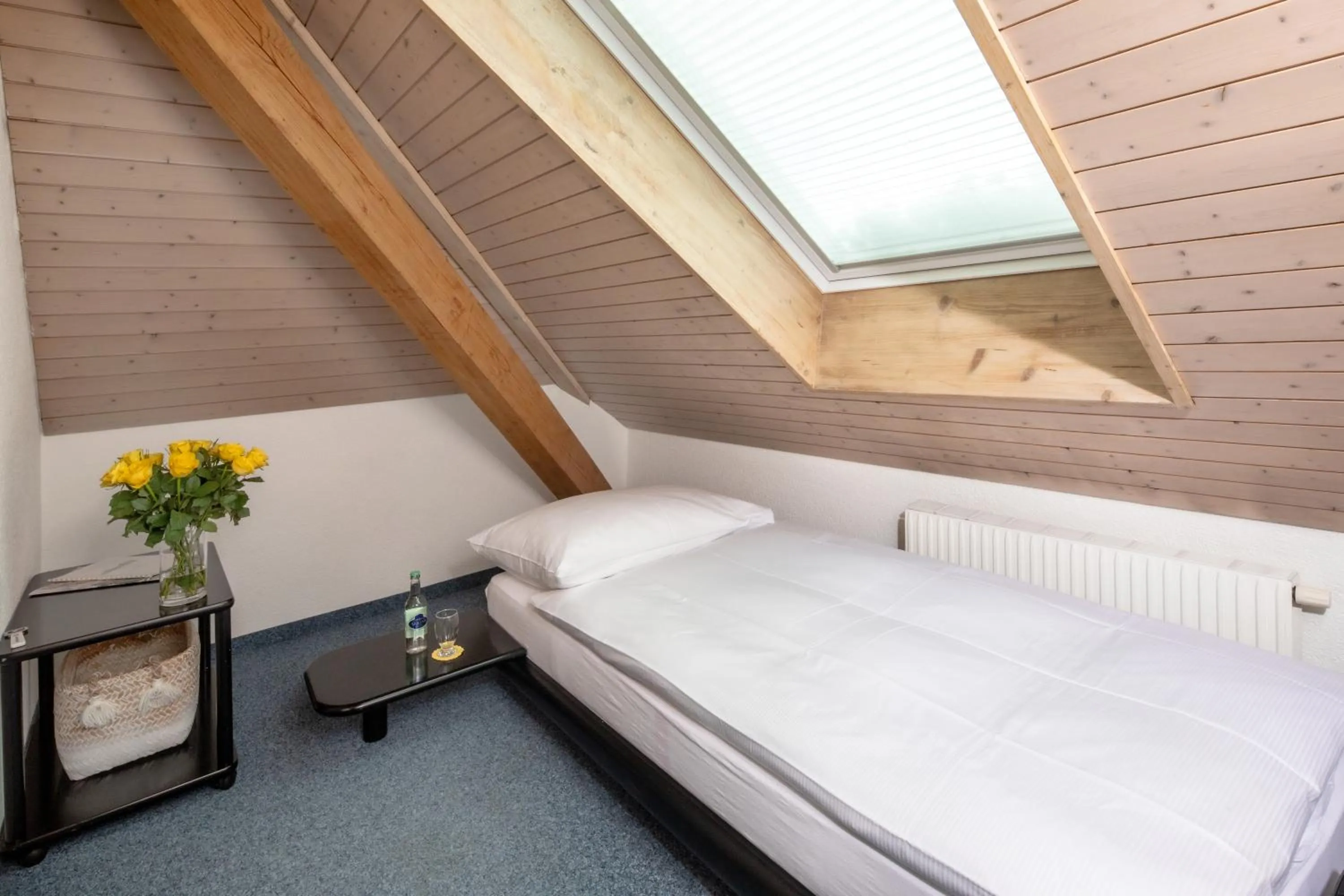 Bed in Gasthof Enge Self Check-In Hotel