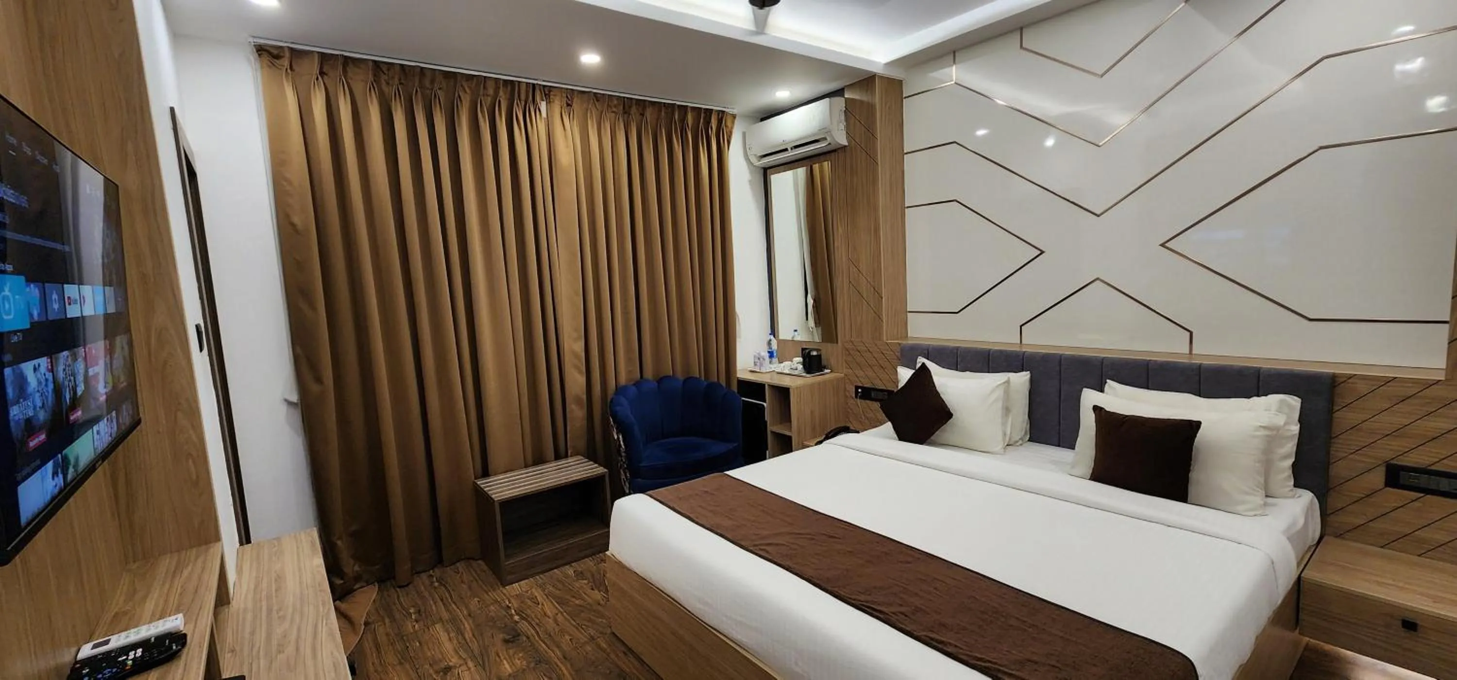 Living room, Bed in Hotel Arcadia