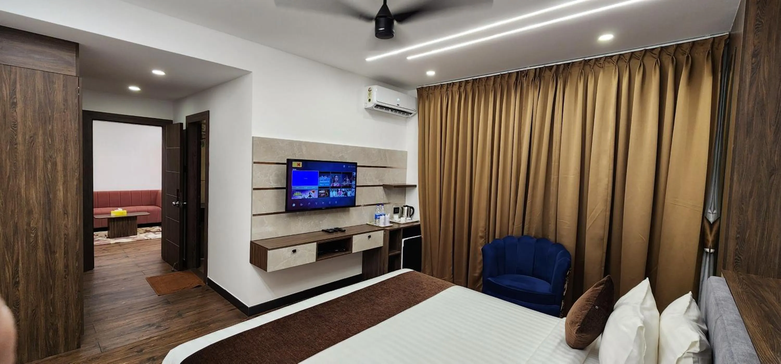 Living room, Bed in Hotel Arcadia