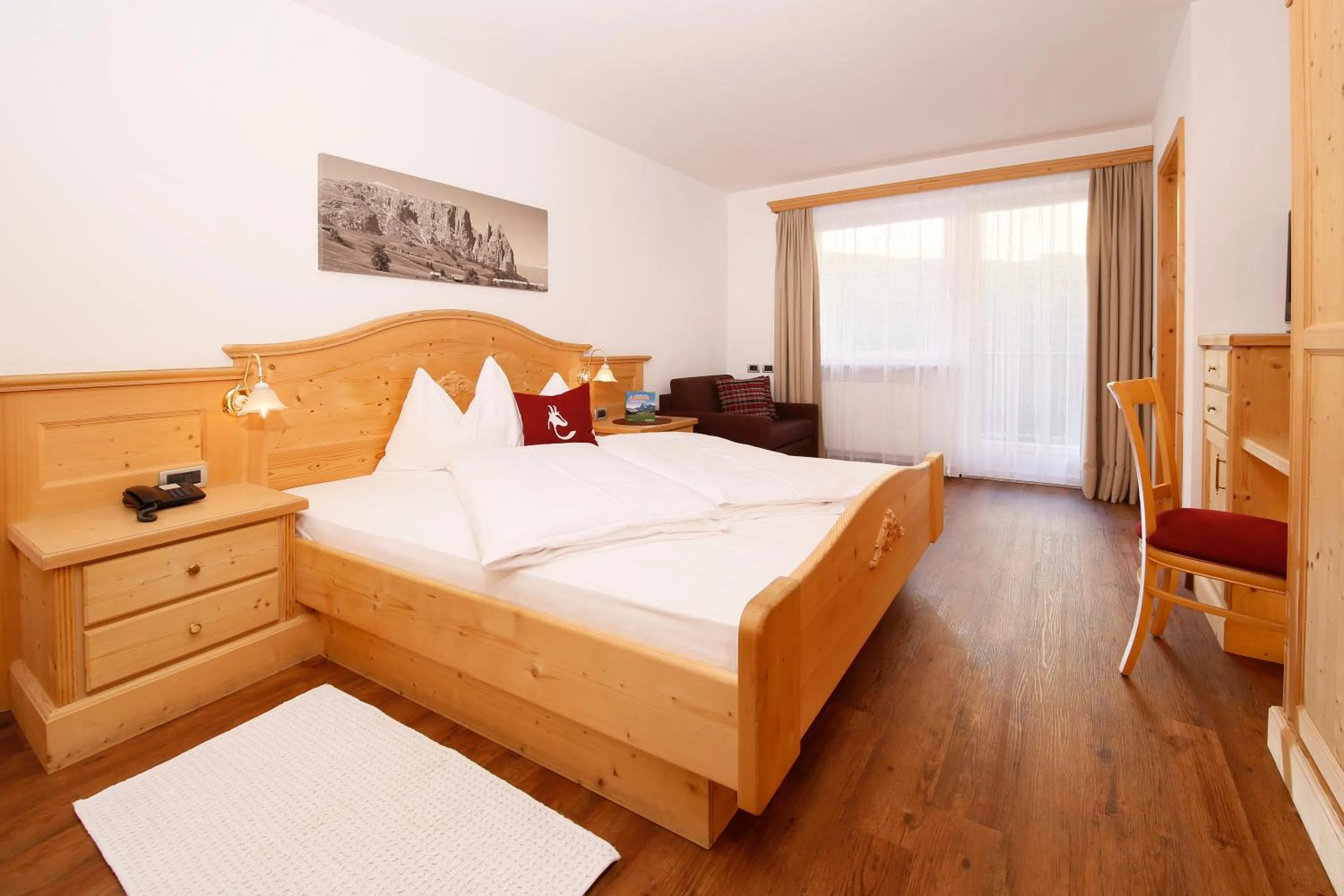 Decorative detail, Bed in Hotel Hubertusstube