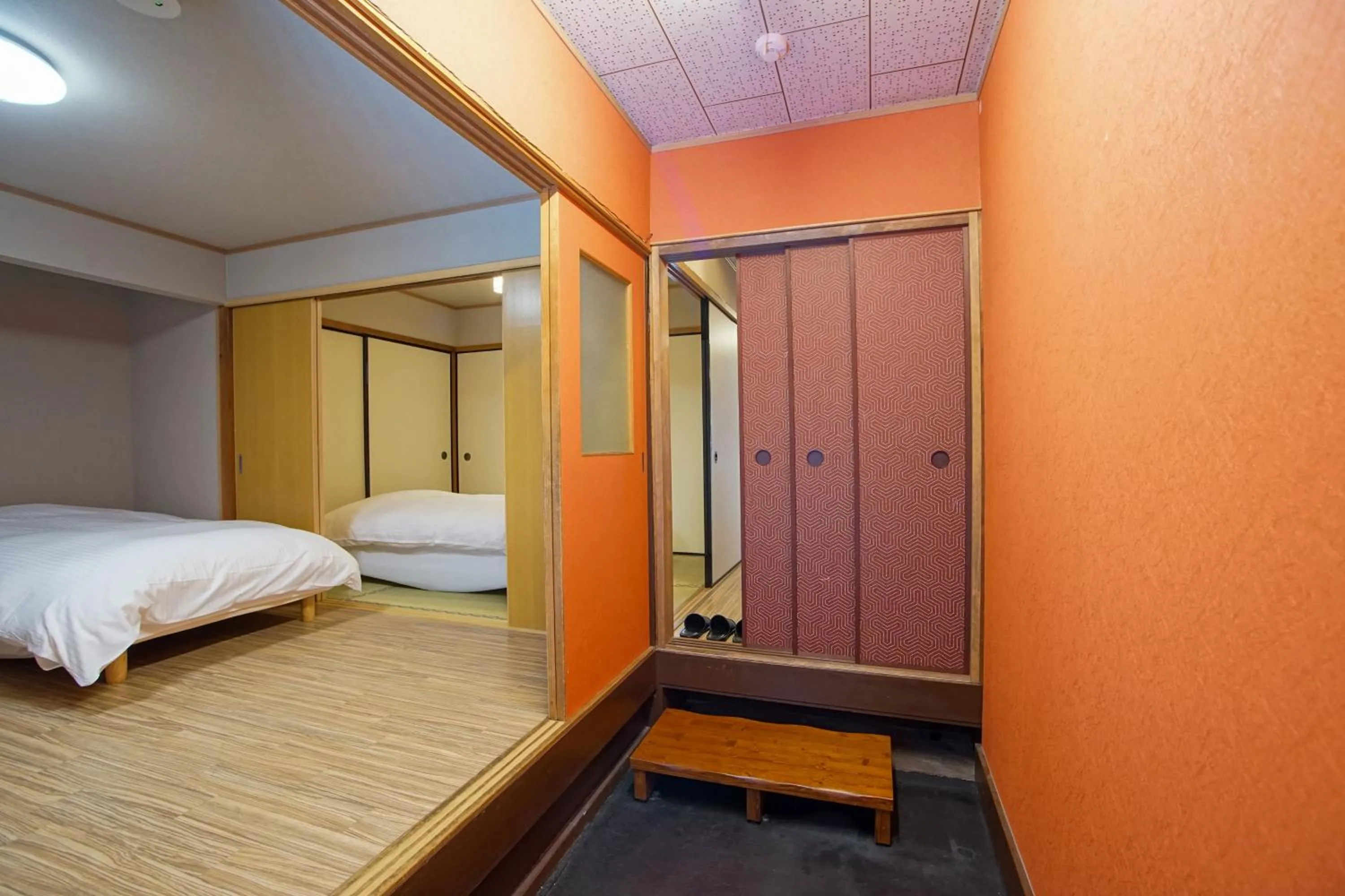 Bed in 京町家 懿造 -Kyomachiya IZO-