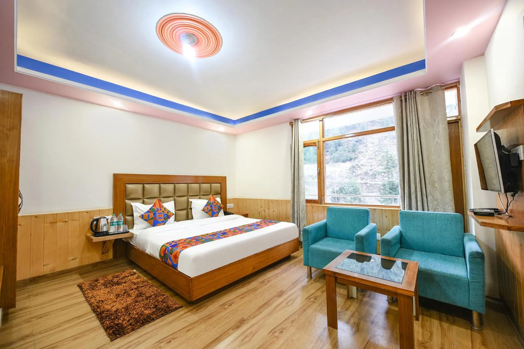 Bed in FabHotel Misty Hills Nehru Kund