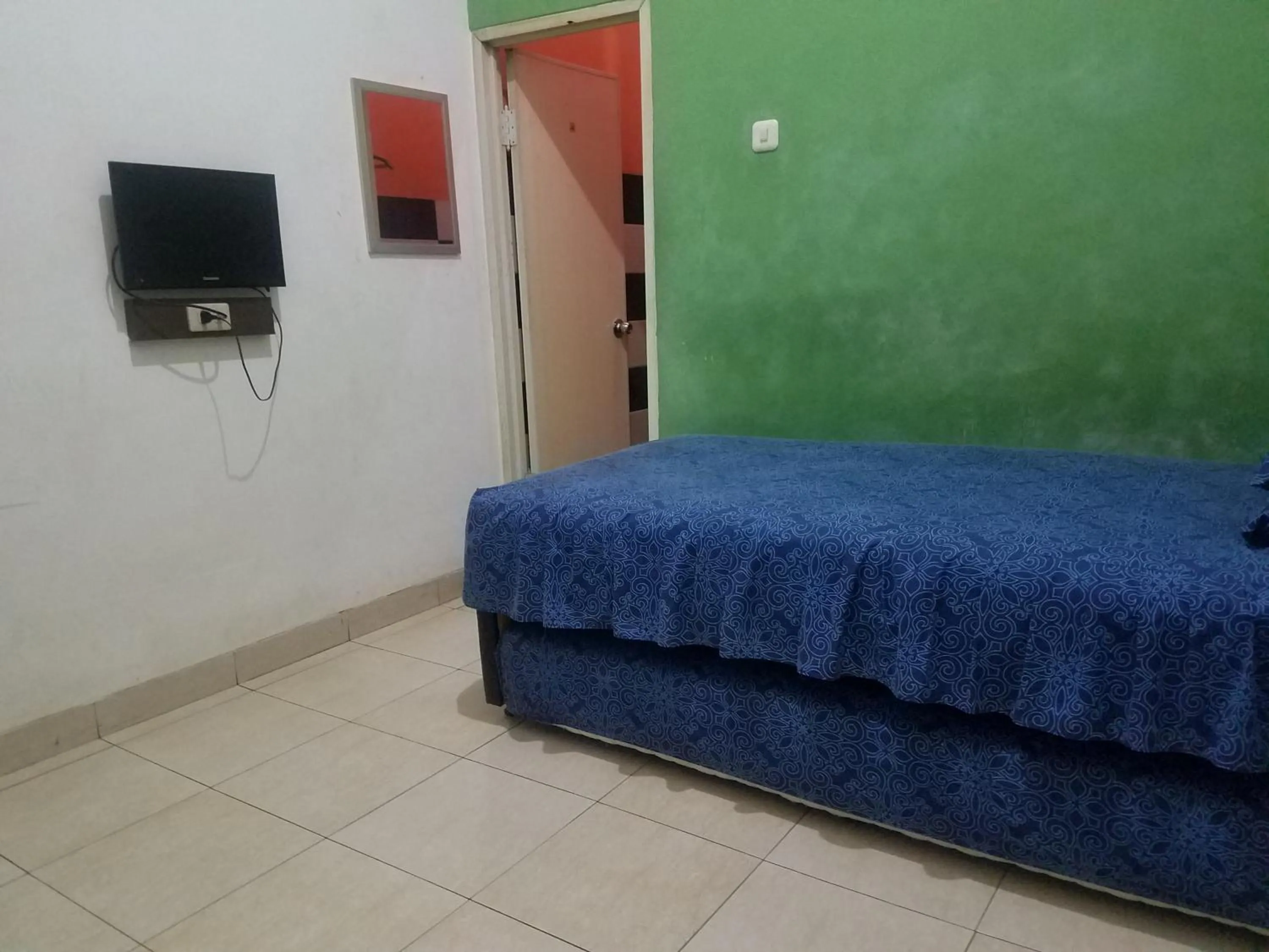 Bed in Cendrawasih Syariah Homestay