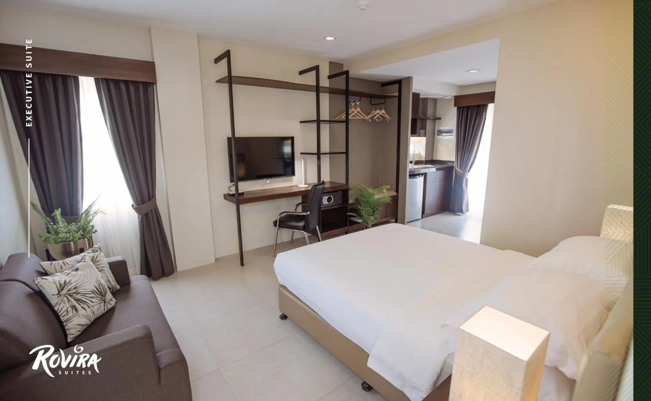 Bed in Rovira Suites