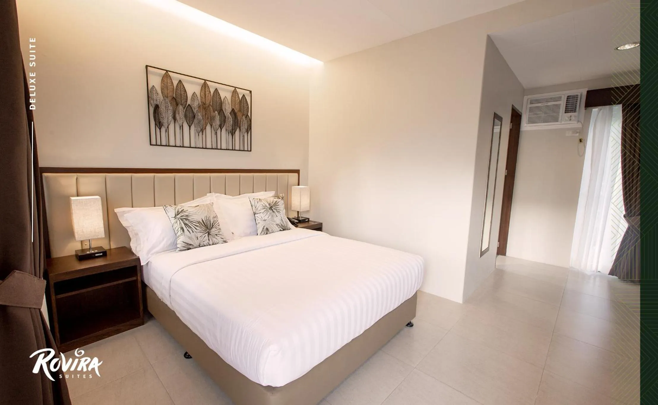 Bed in Rovira Suites