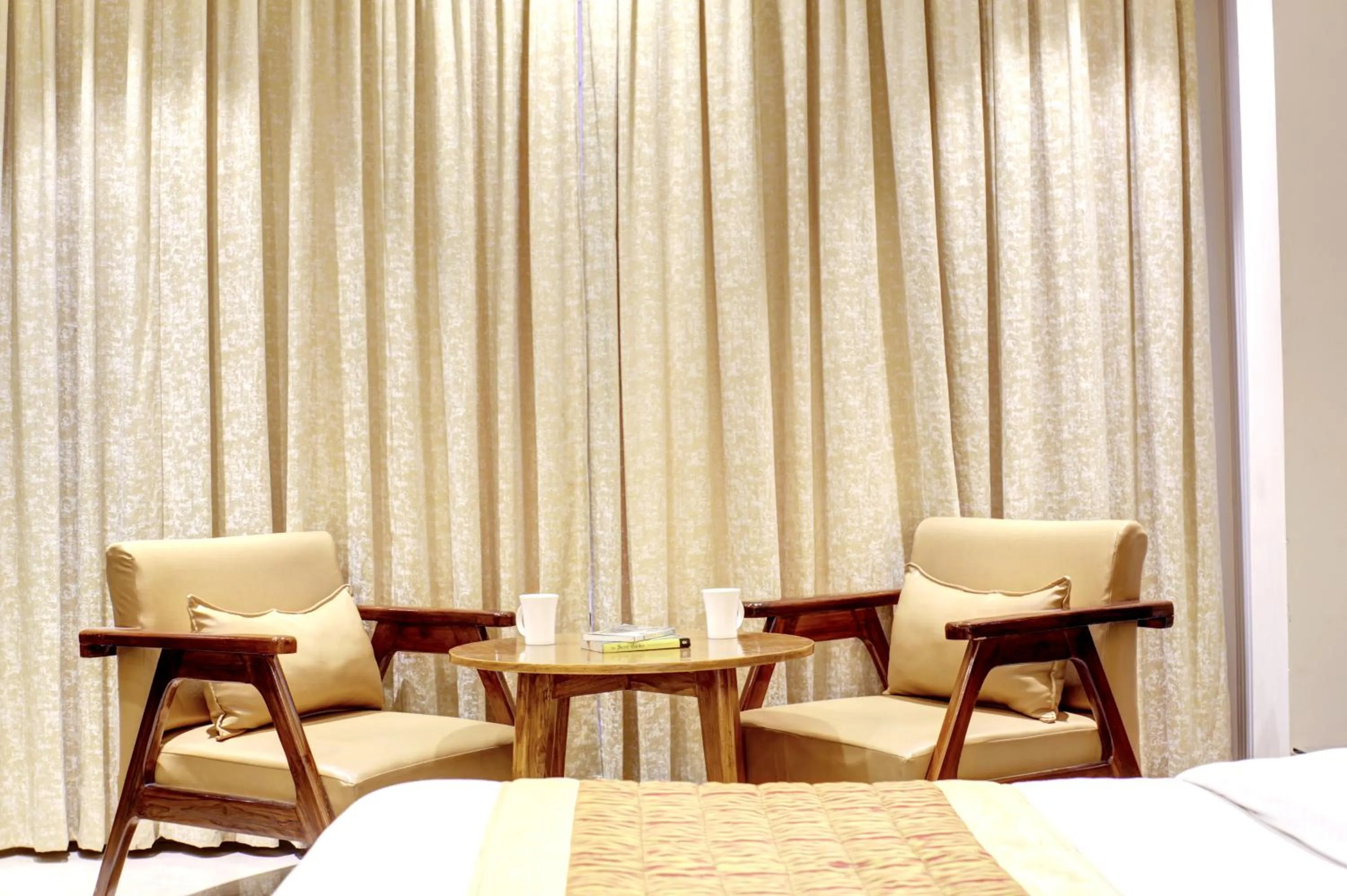 Seating area in Hotel Krishna Plaza Just Near New Delhi Station And Connaught Place By M S Hospitality