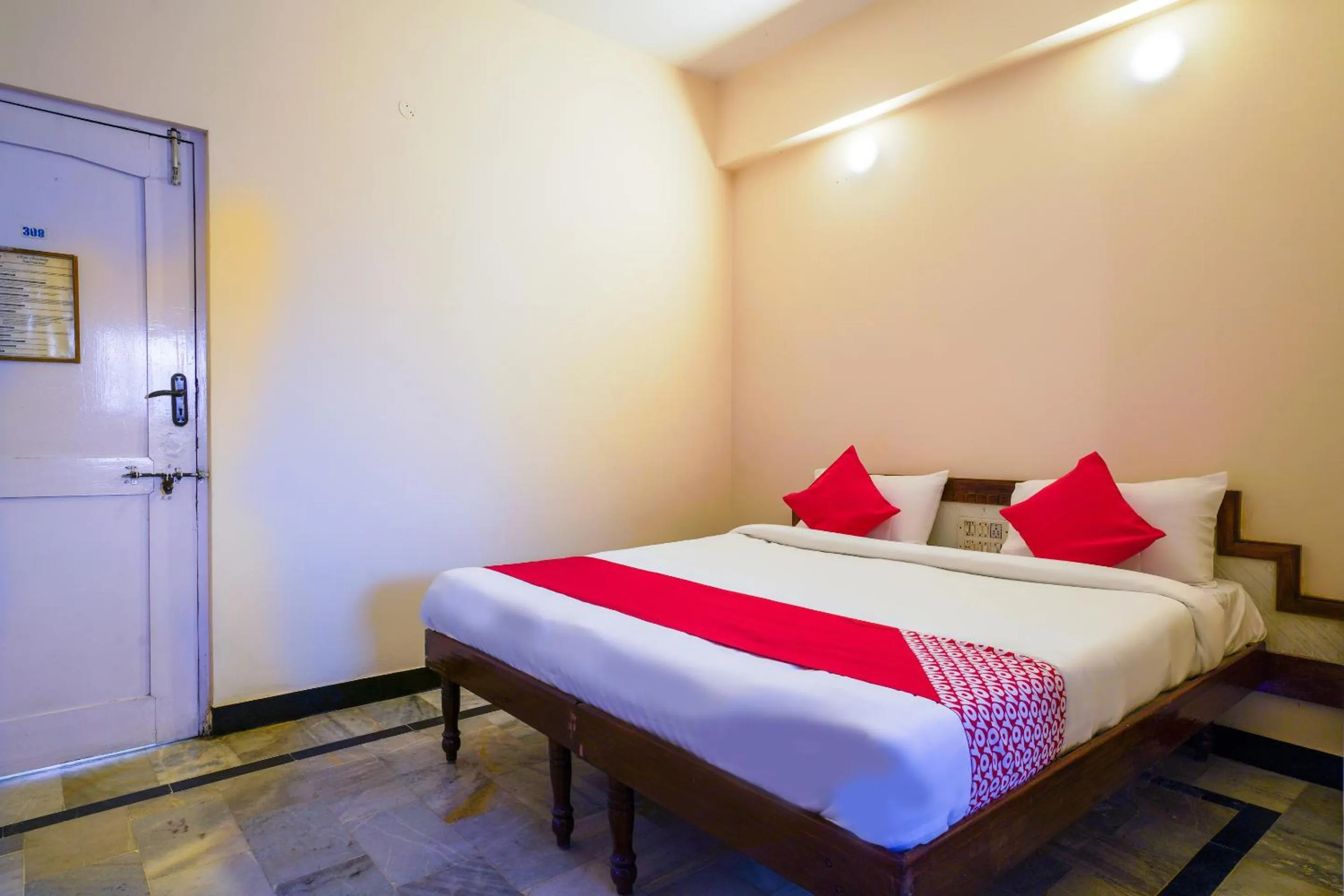 Bedroom, Bed in Hotel O Raja Residency Near Snow World