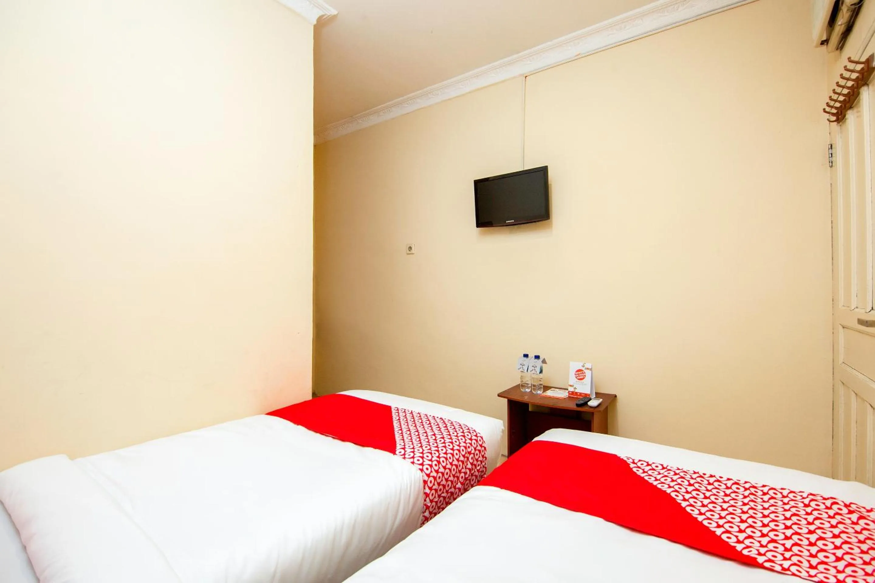 Bedroom in Hotel O 211