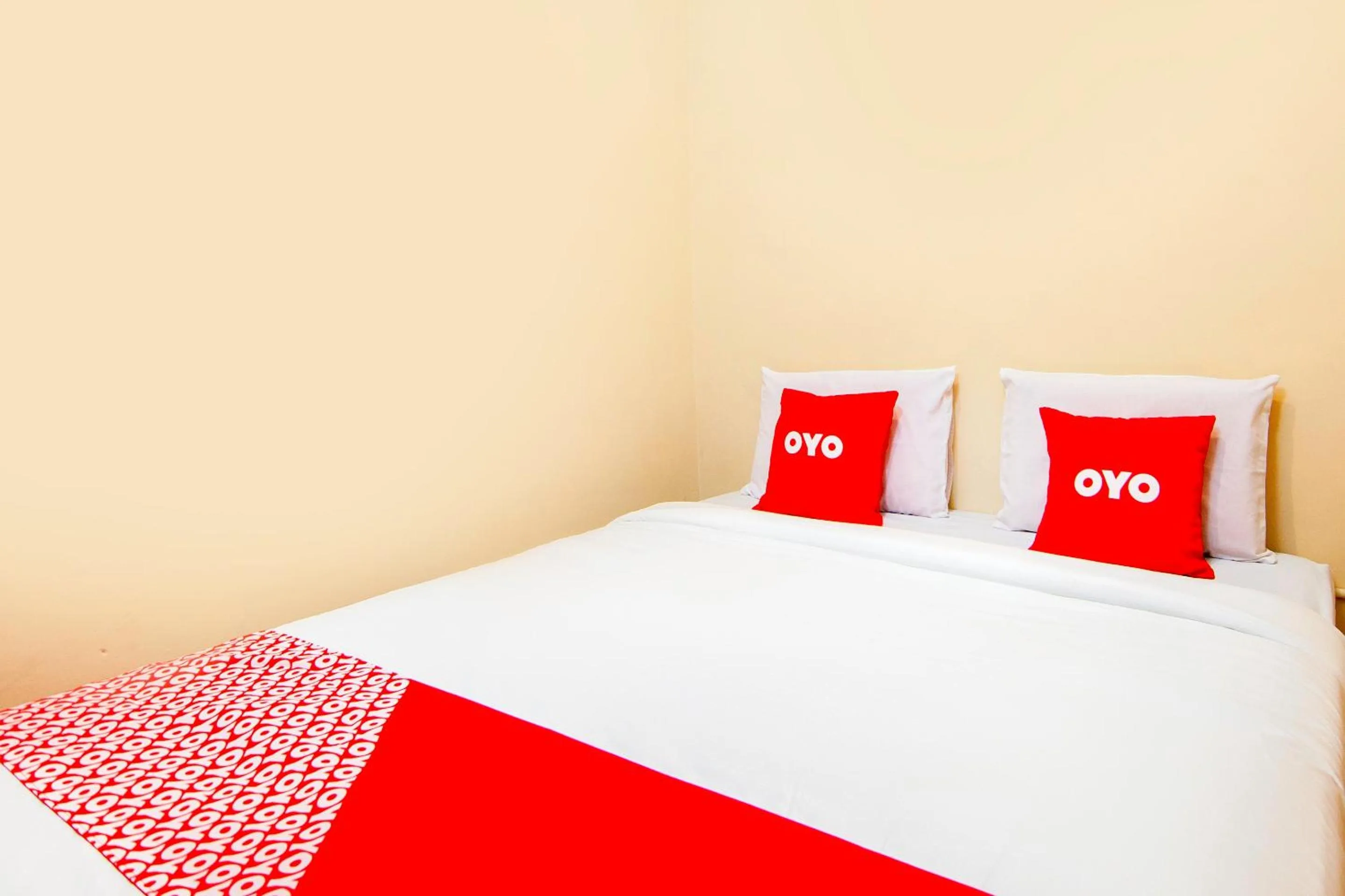 Bedroom in Hotel O 211