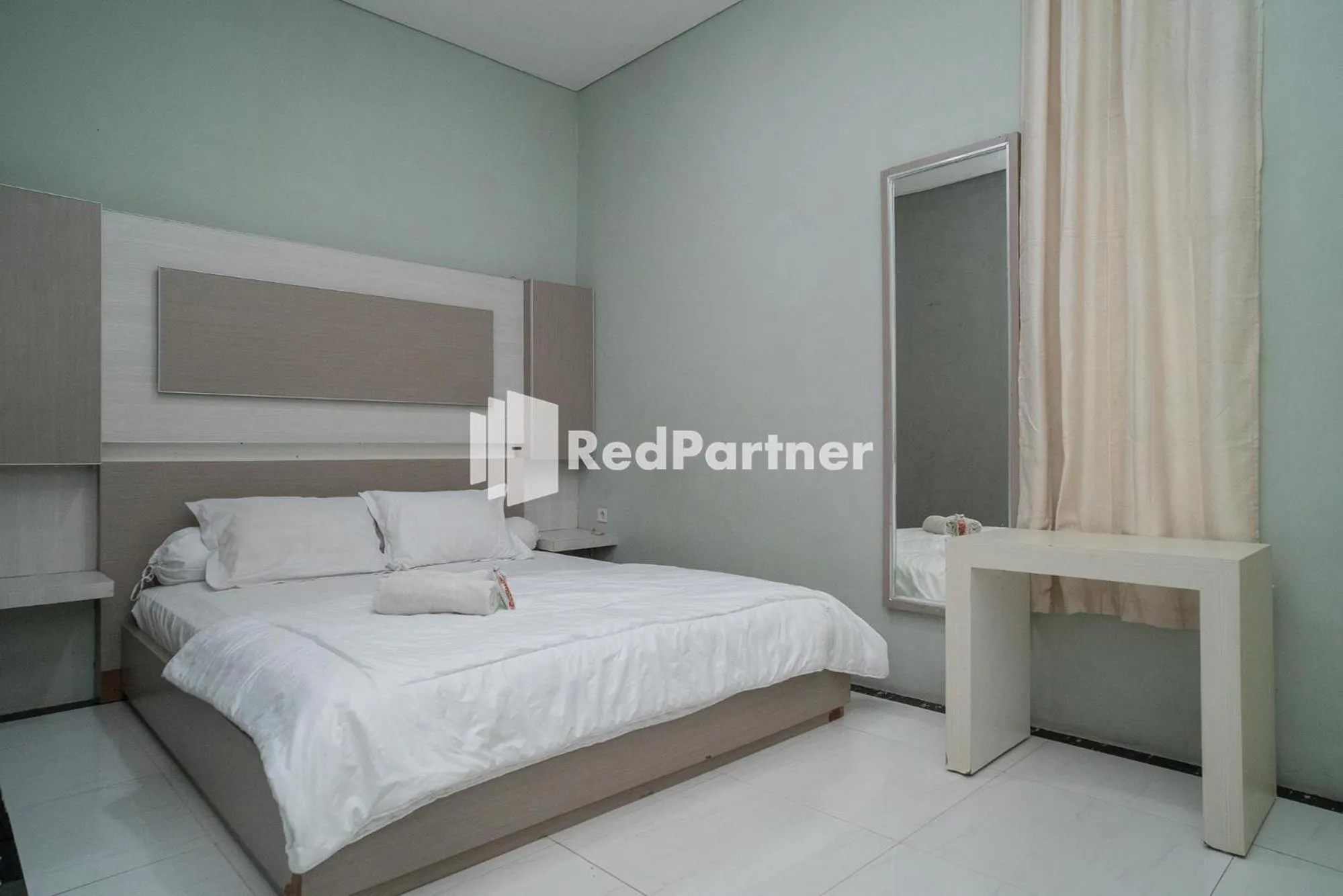Bed in Yayah Rooms Bogor Syariah Mitra RedDoorz