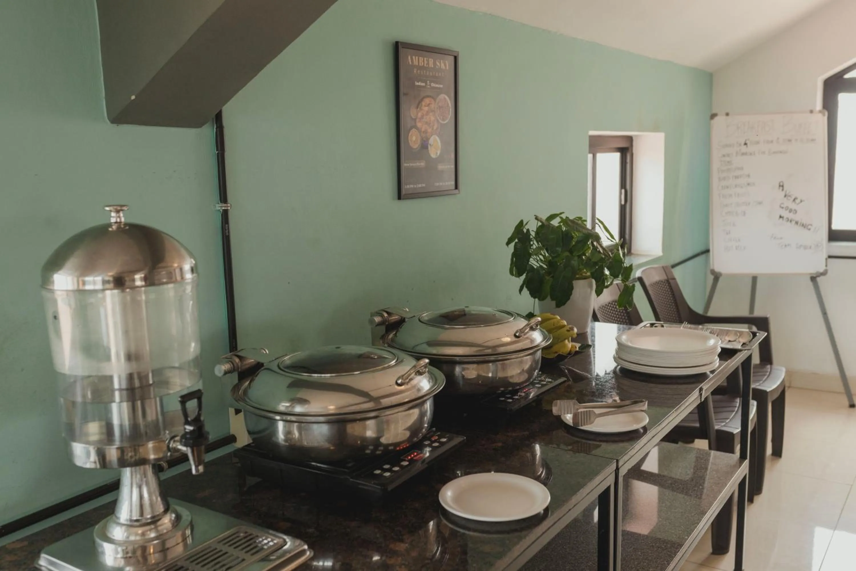 Kitchen or kitchenette in Amber Rooms