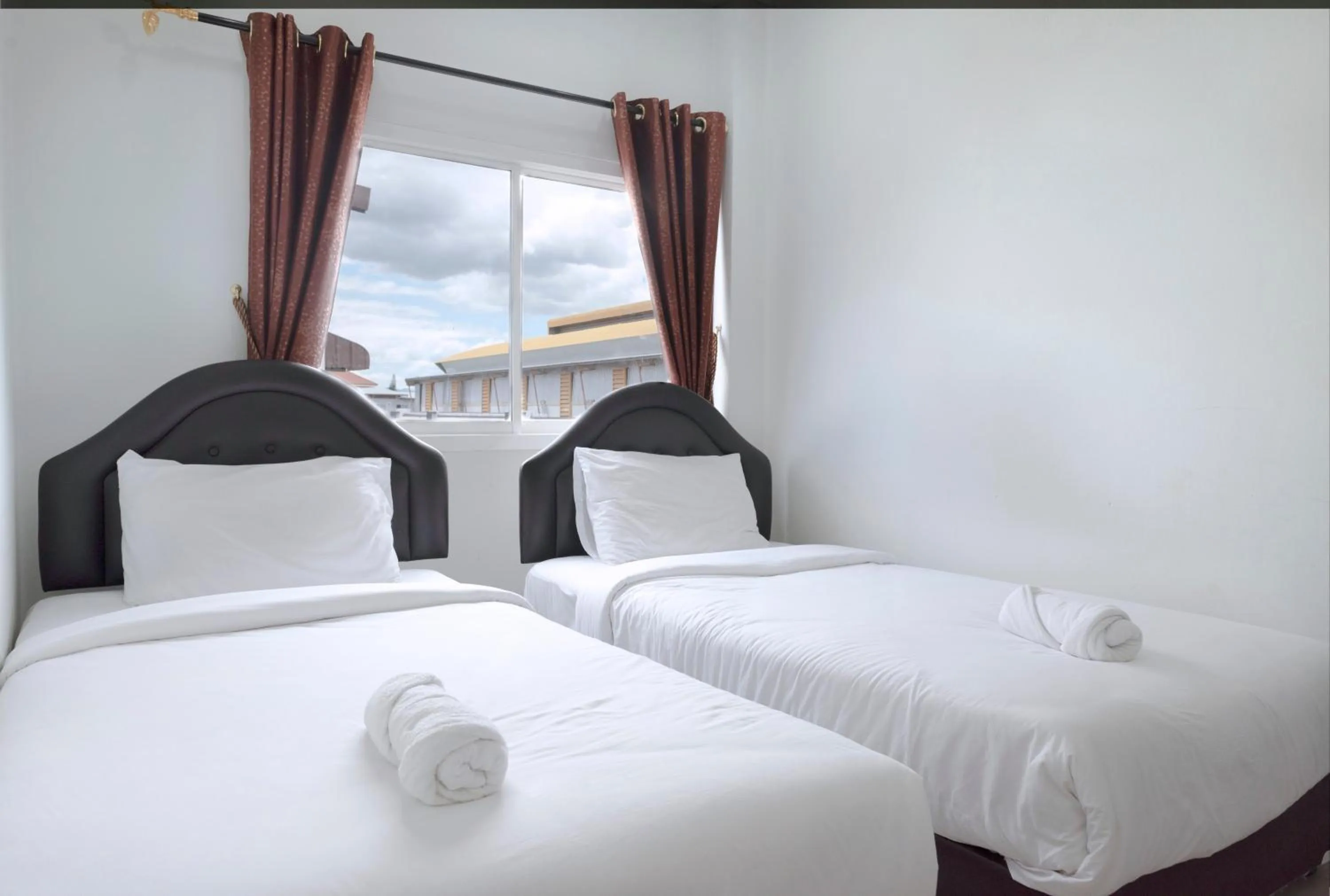 Bed in Mee Hug Guesthouse