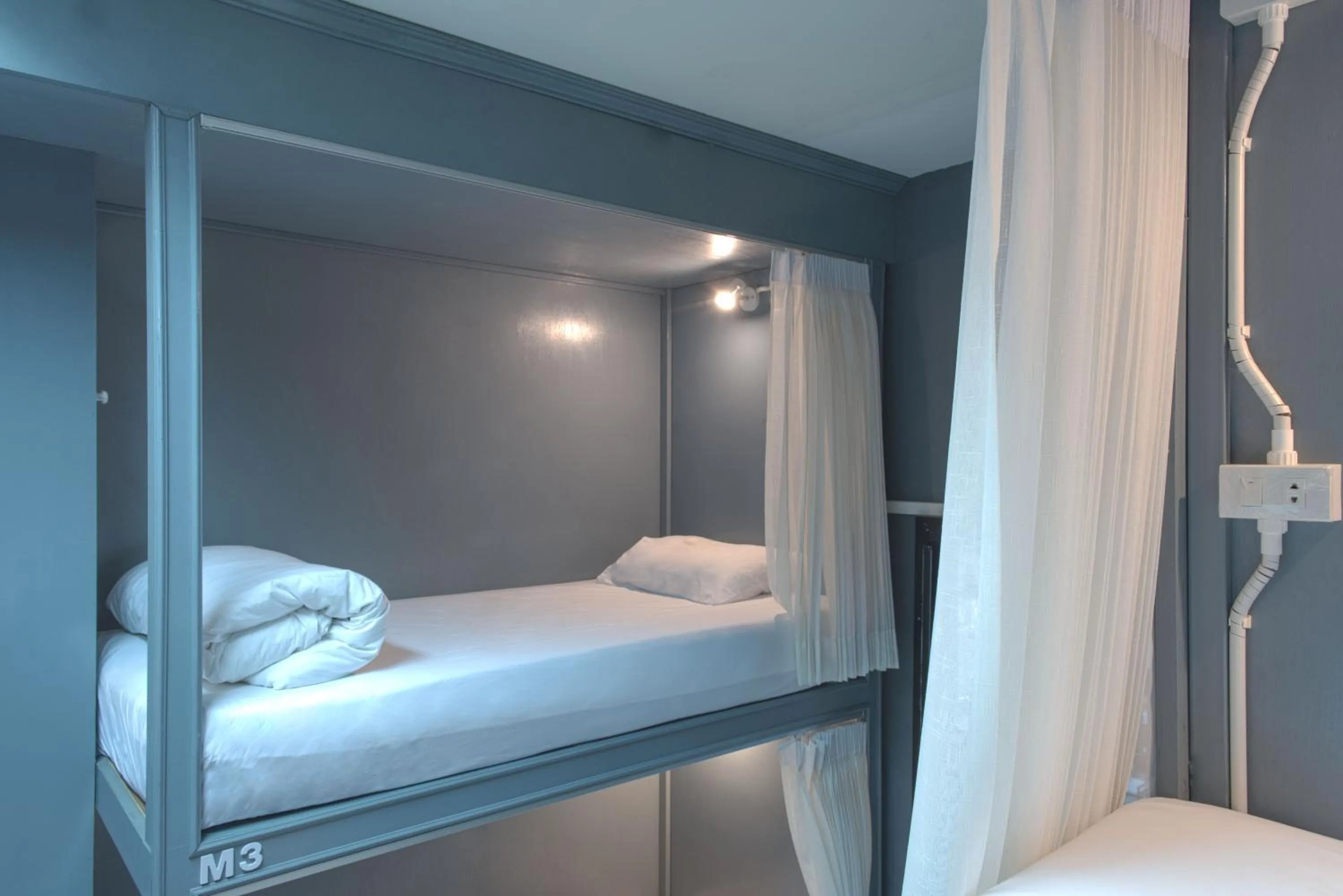 Bed in Mee Hug Guesthouse