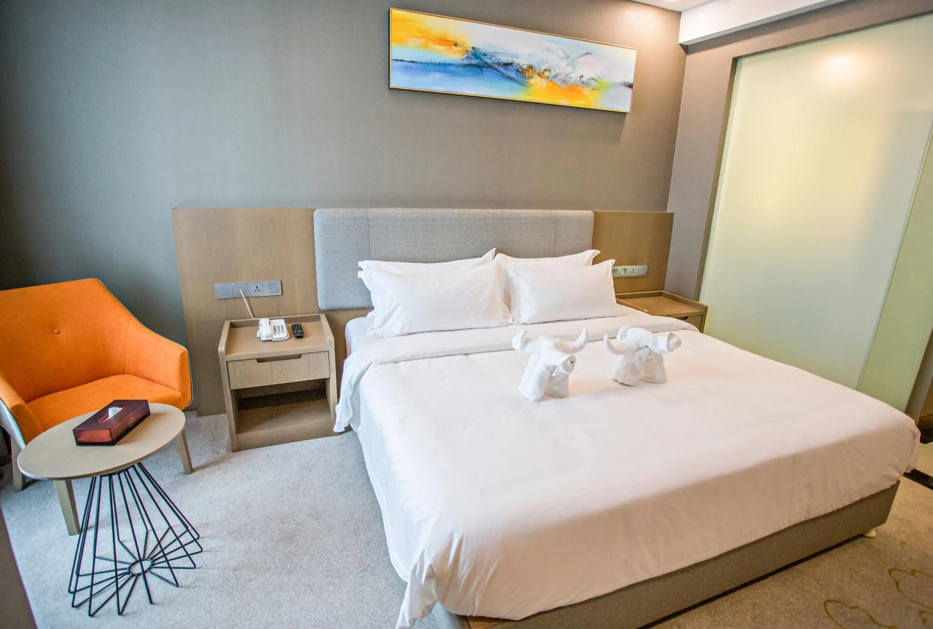 Bed in GRAND FLORA HOTEL