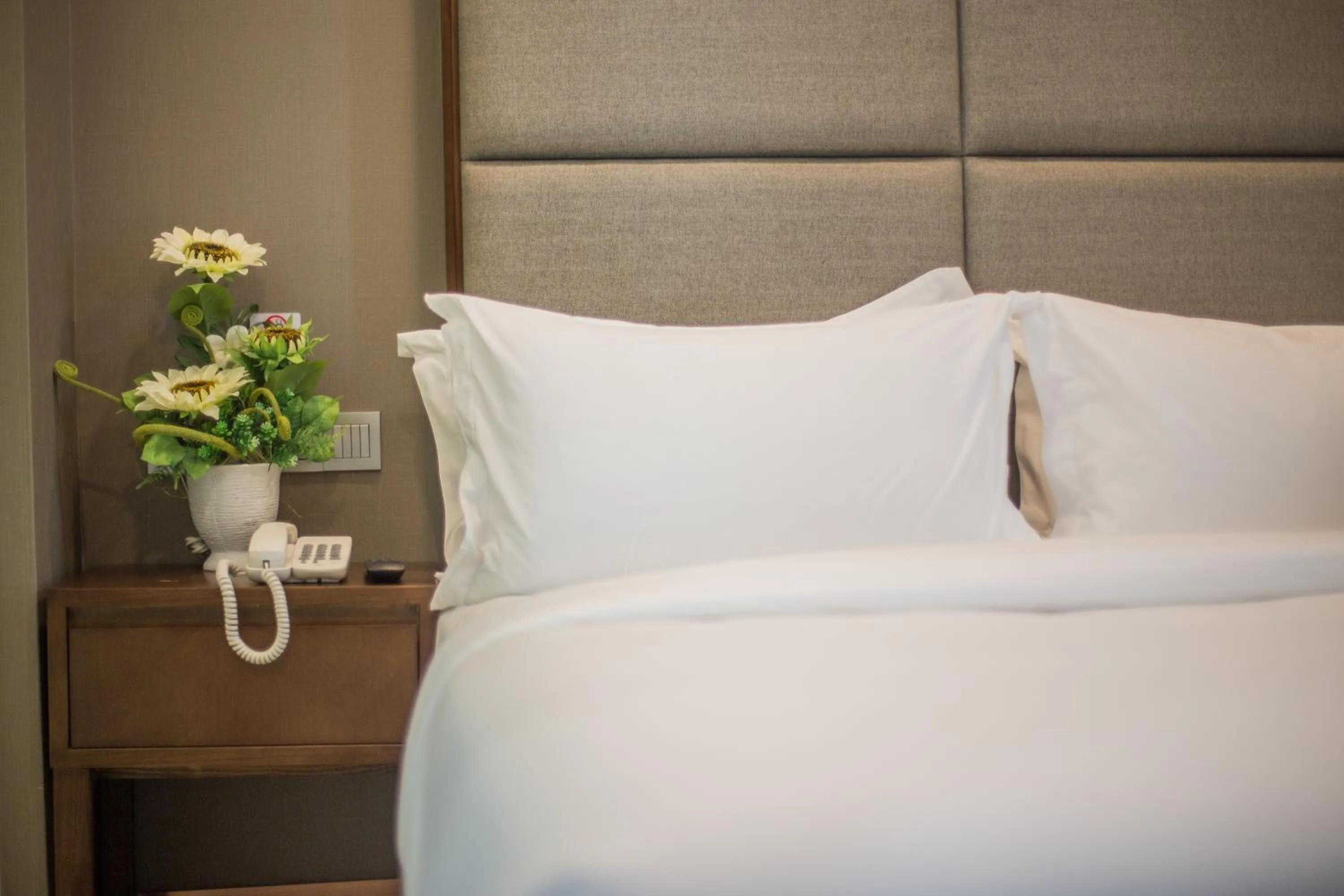 Bed in GRAND FLORA HOTEL