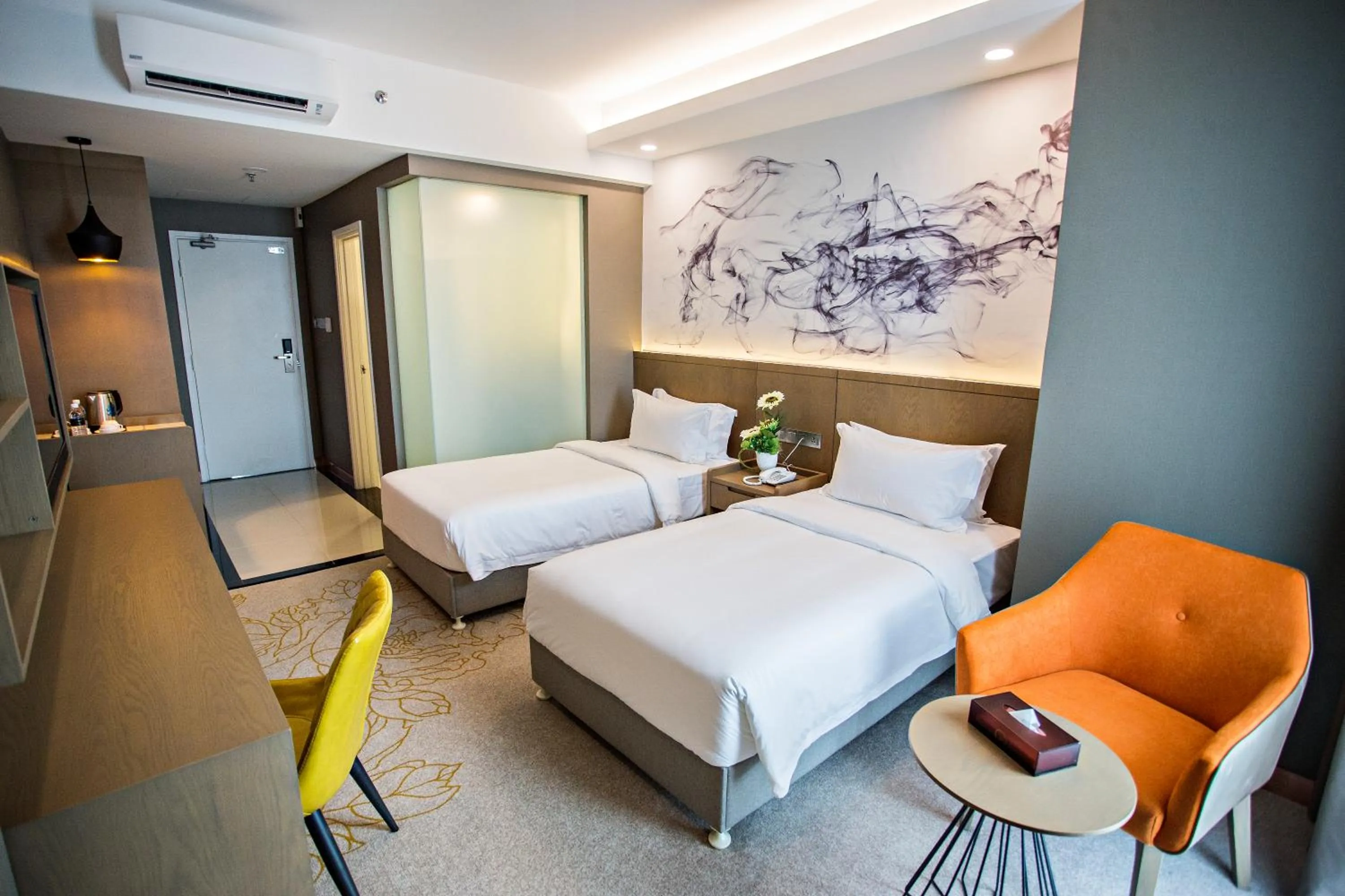 Bed in GRAND FLORA HOTEL