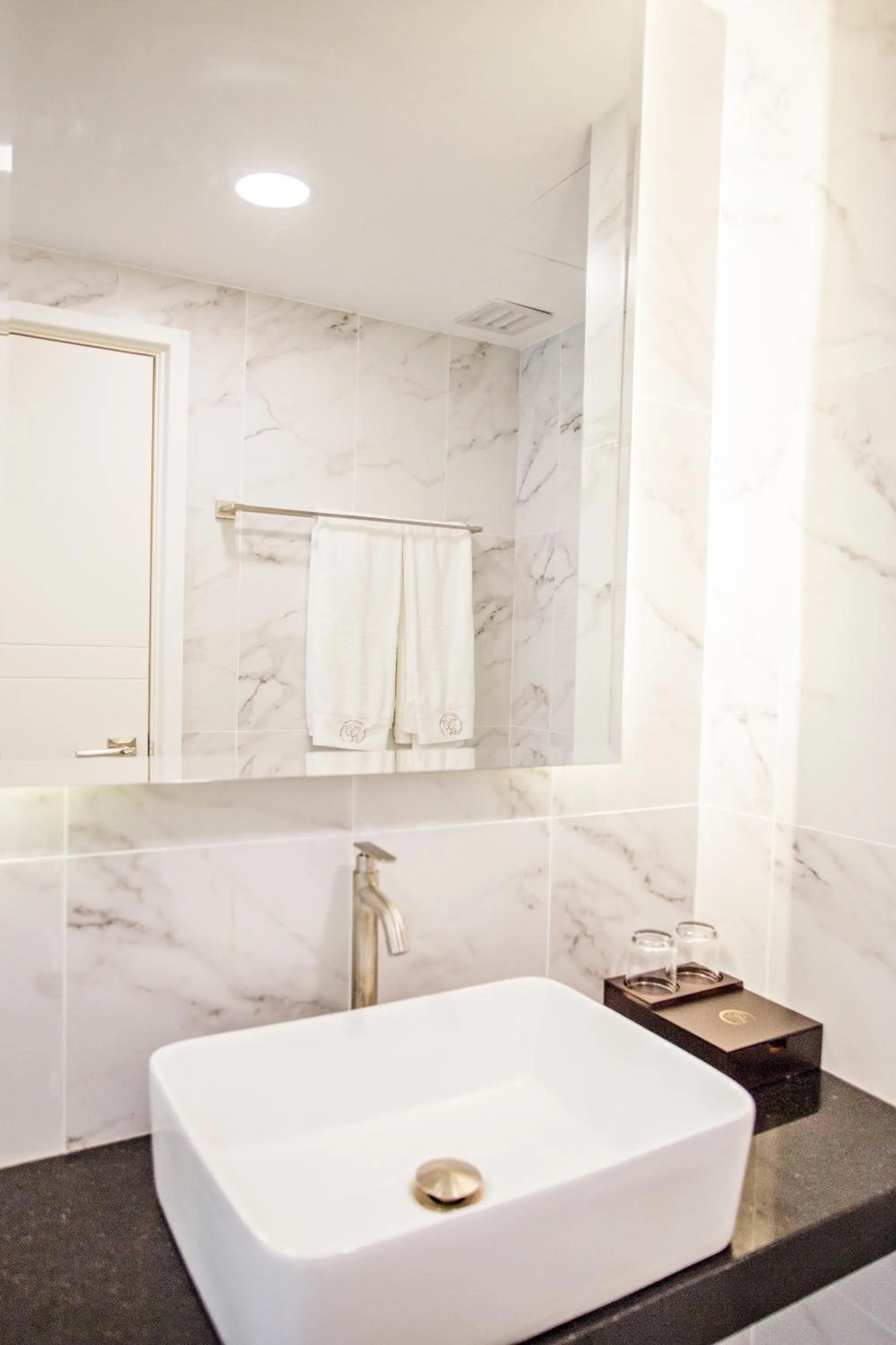 Bed in GRAND FLORA HOTEL