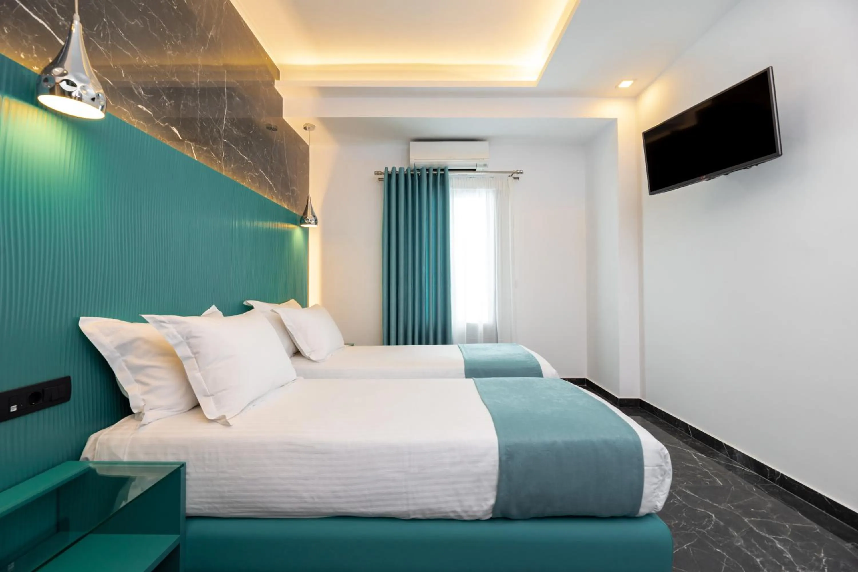 Bedroom, Bed in Deluxe Suites Santorini